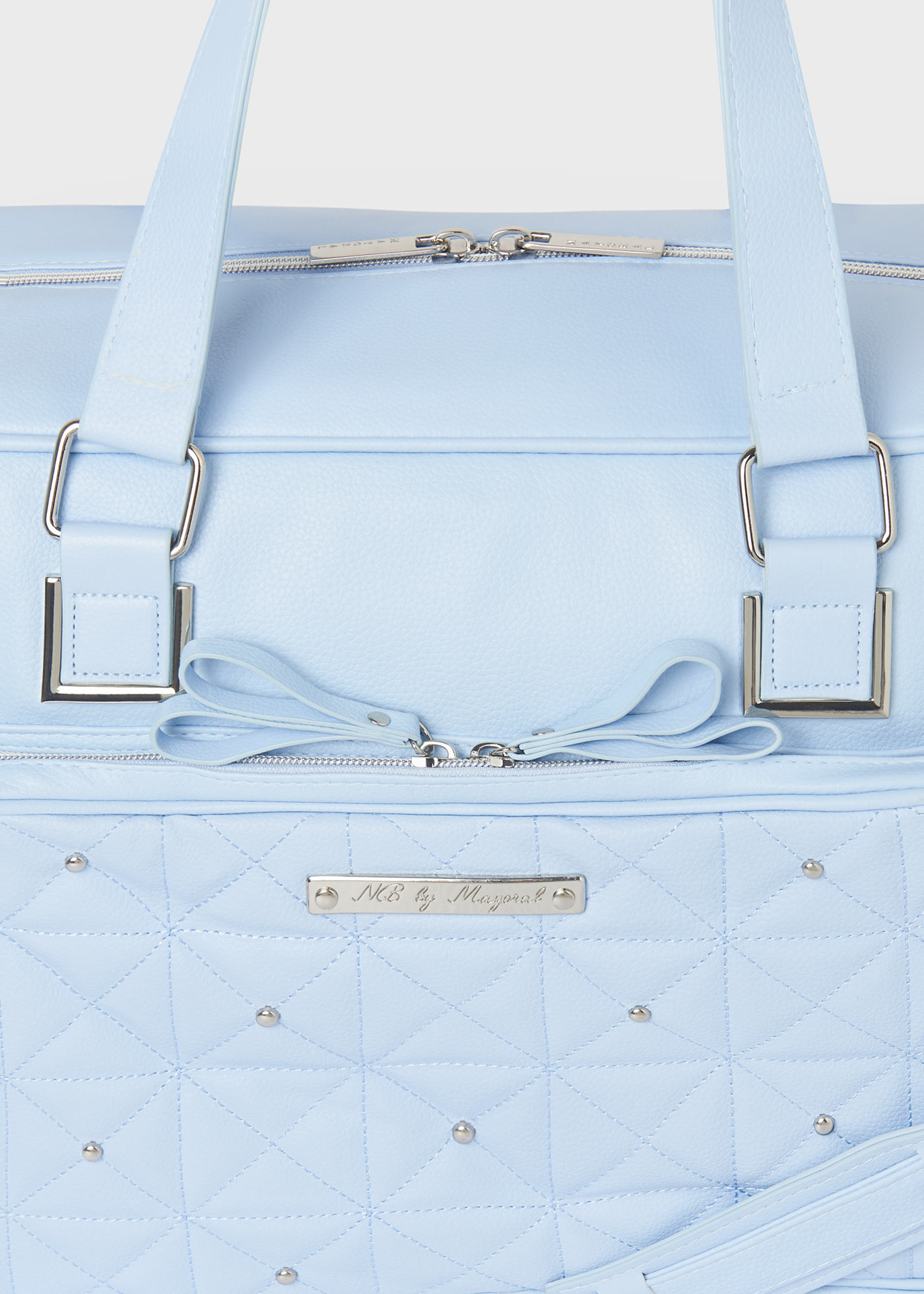 Changing bag with appliques and dummy holder