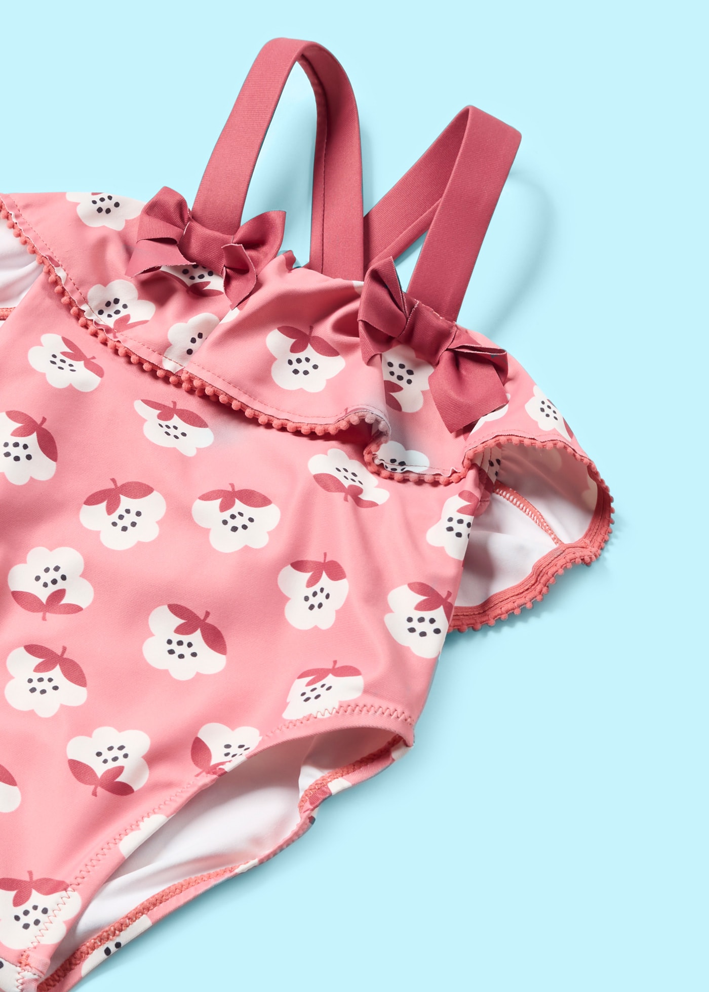 Costume stampato con bretelle incrociate neonata