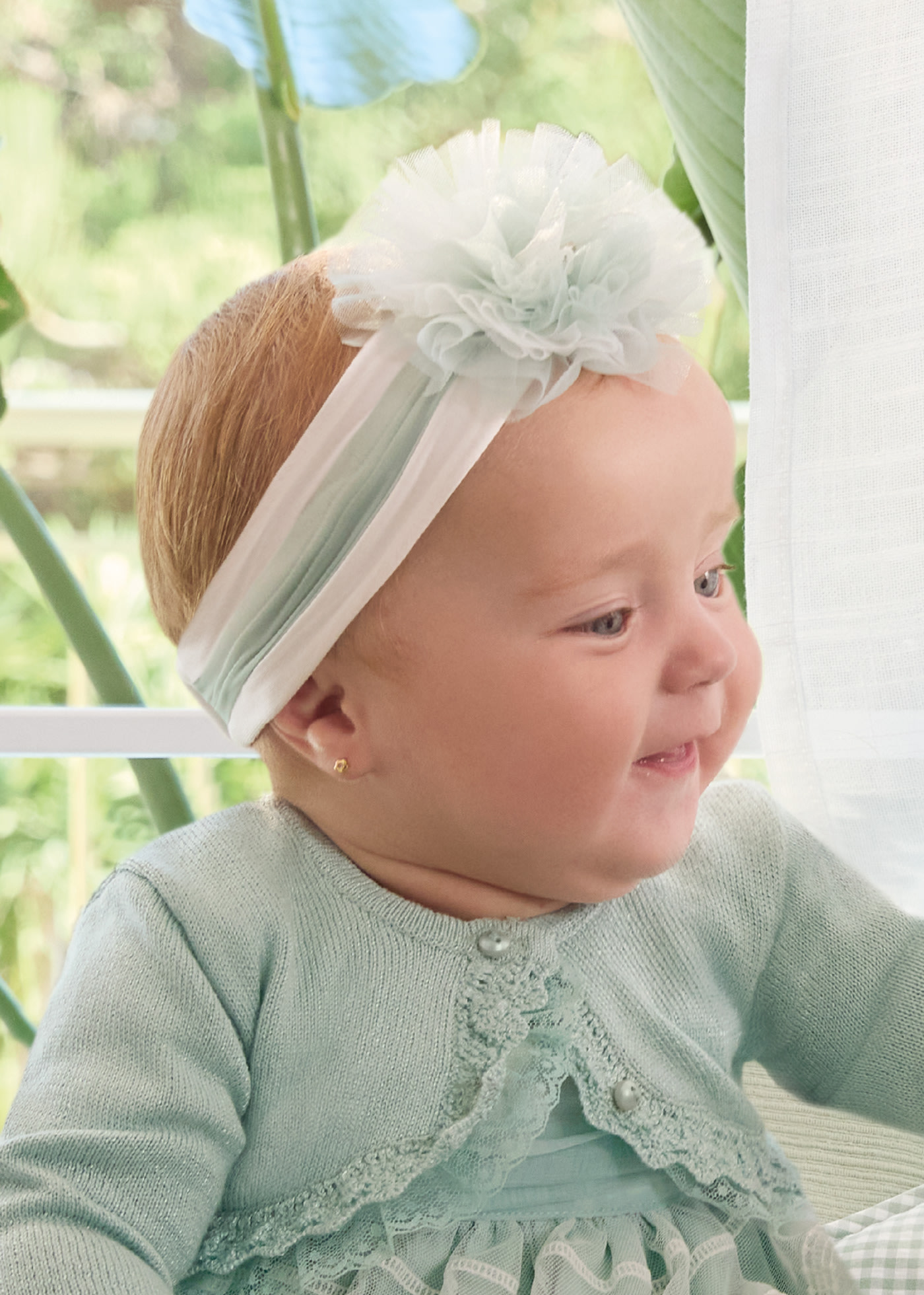 Fascia elasticizzata per capelli neonata