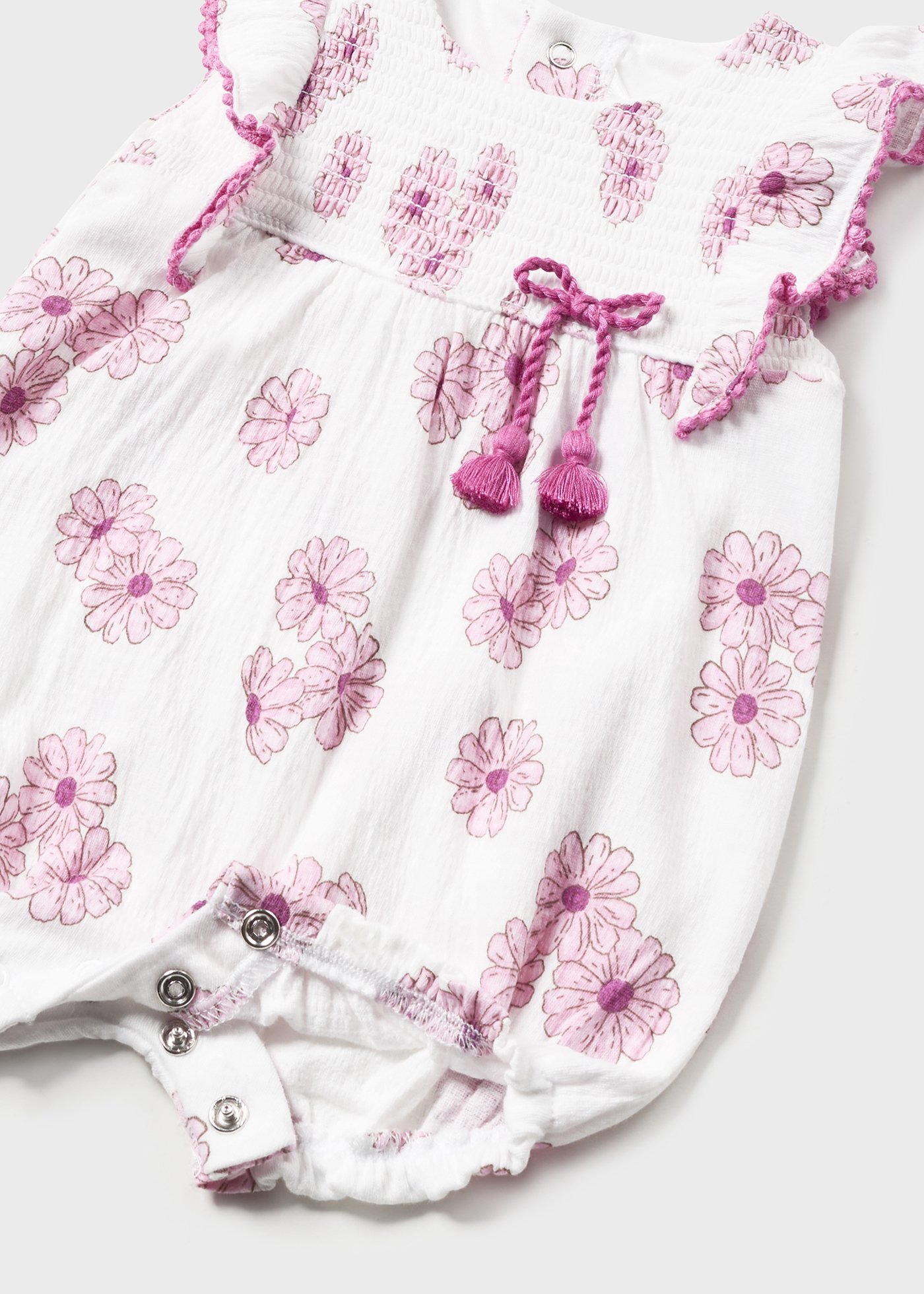 Pagliaccetto con cappello a fiori neonata