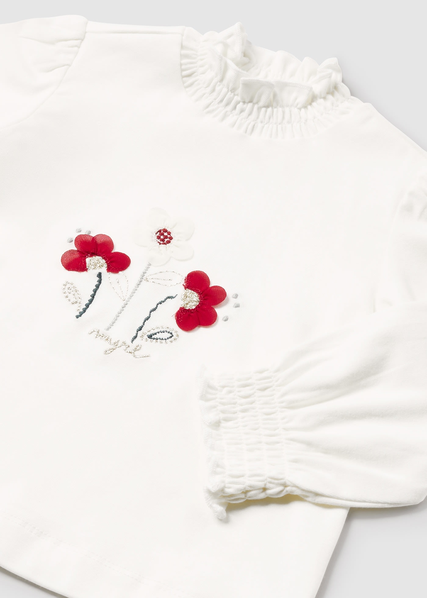 Camiseta semicisne flores bebé