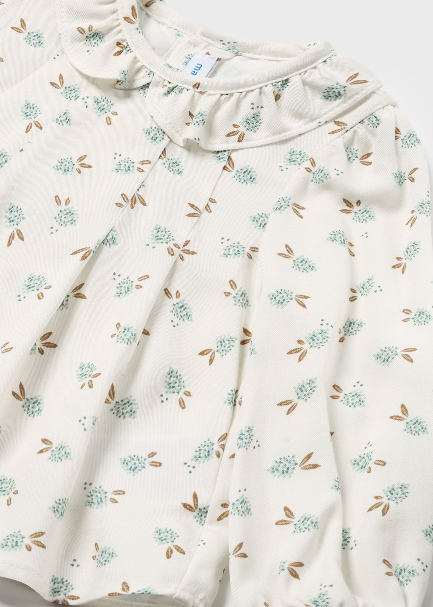 Blouse fleurs col à volants bébé