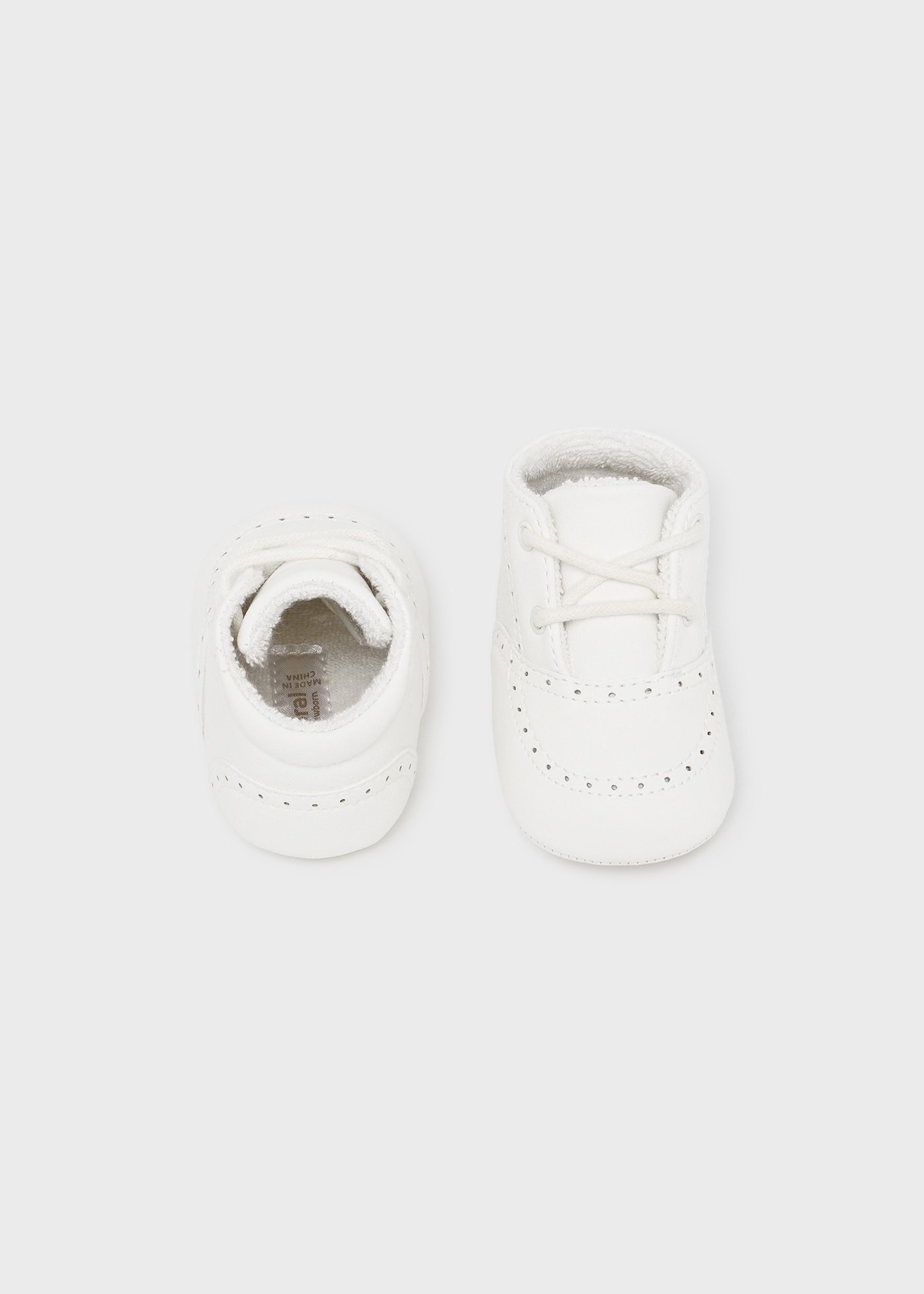 Scarpe traforate neonato
