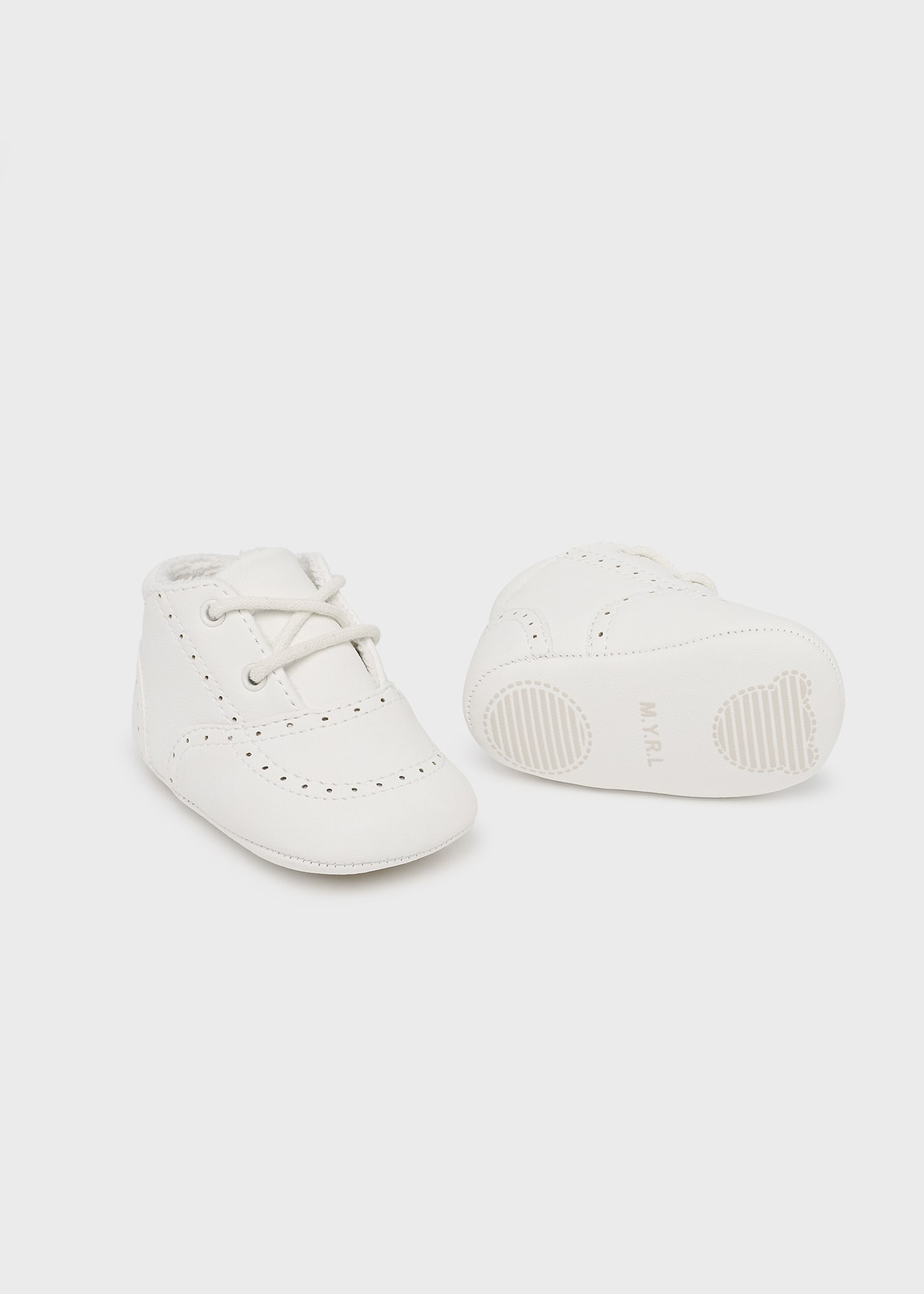 Scarpe traforate neonato