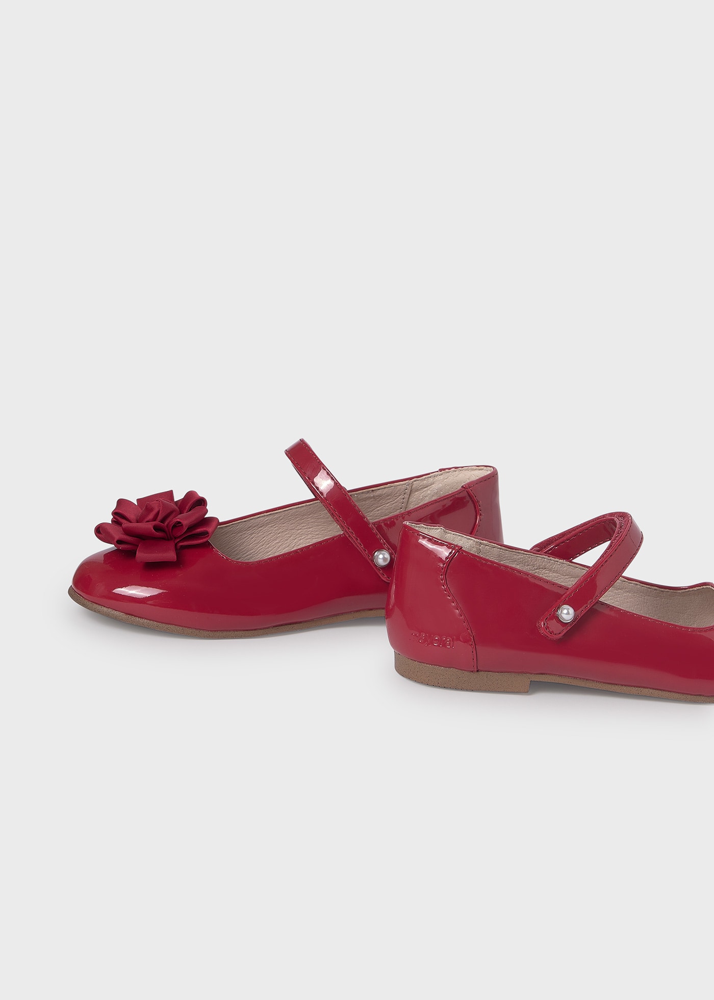 Ballerine vernice fiore ragazza