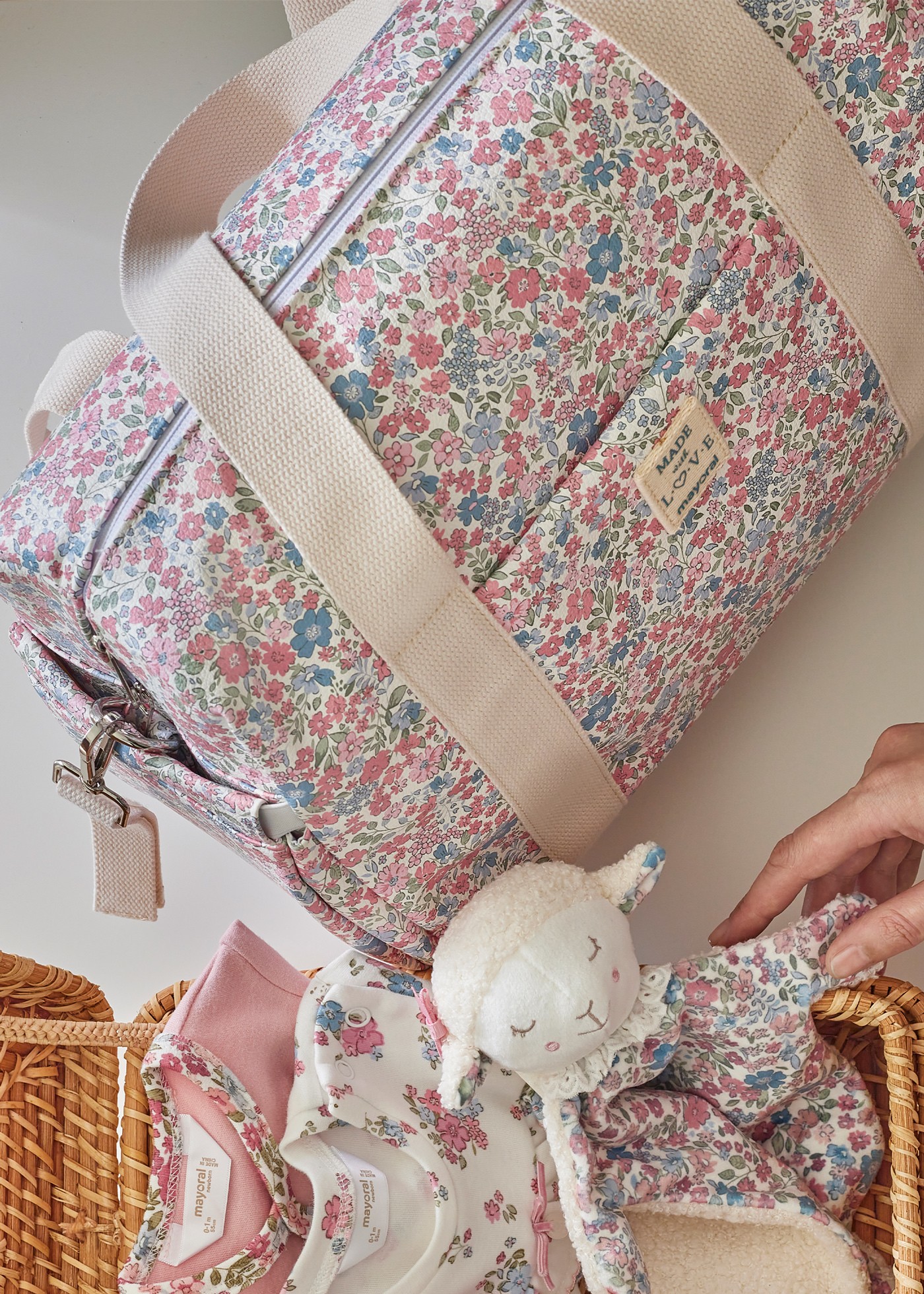 Saco com acessórios estampado bebé