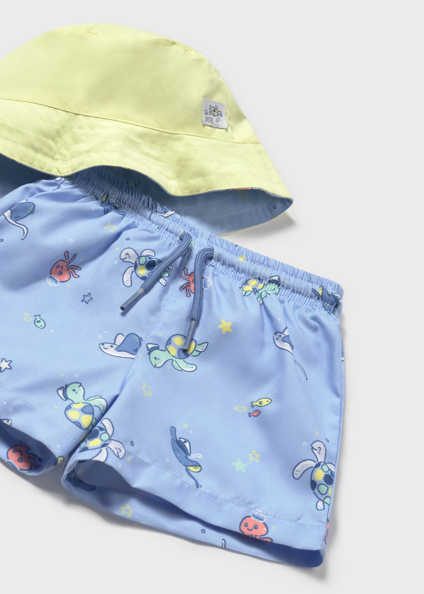 Baby reversible swimming shorts and sun hat with sun protection