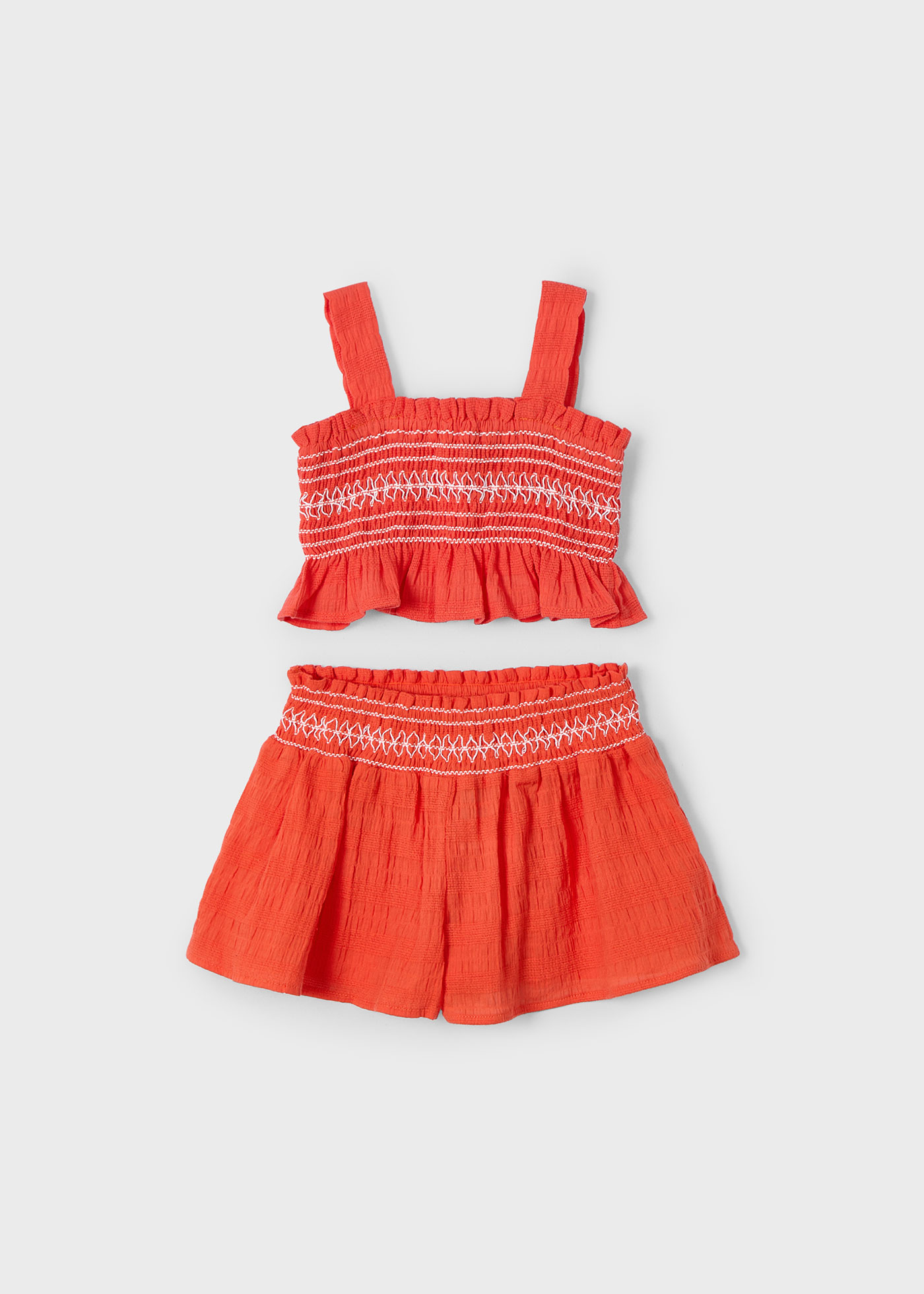 Completo shorts e top nido d'ape bambina