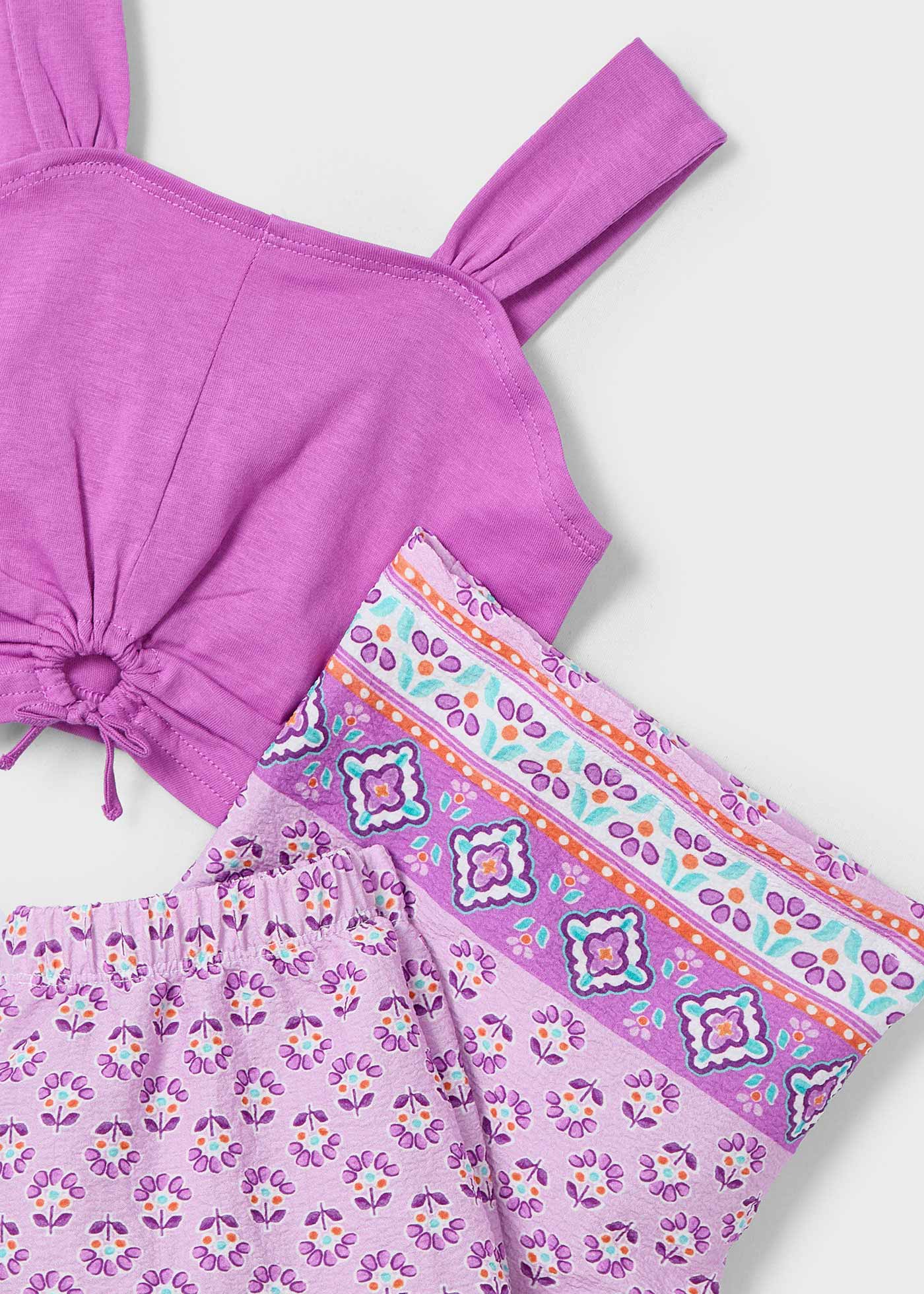 Conjunto de pantalón largo estampado y top niña