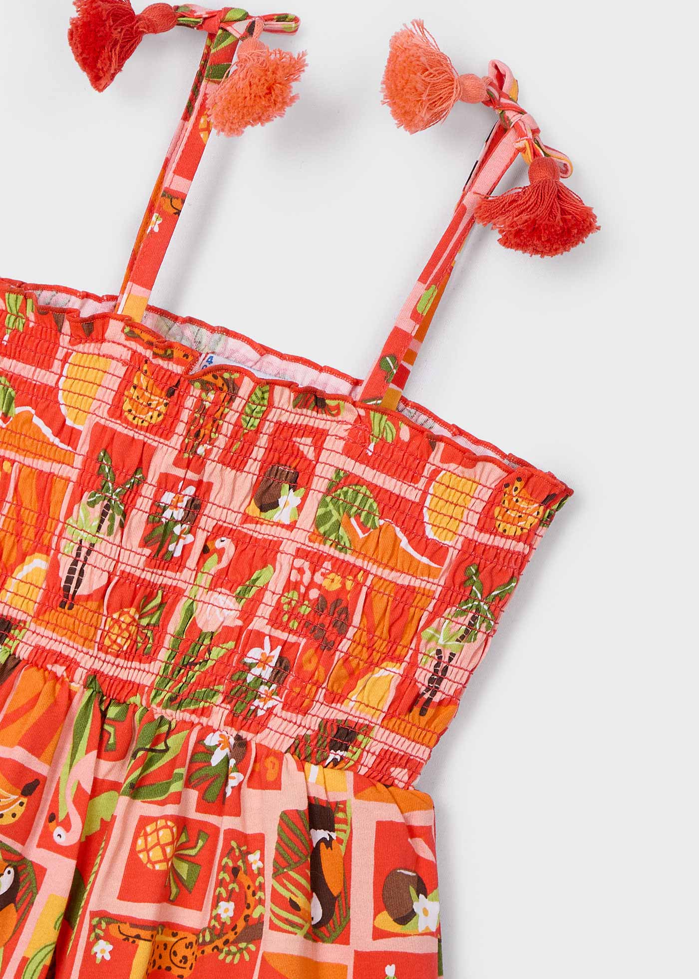Macacão curto estampado ninho de abelha menina