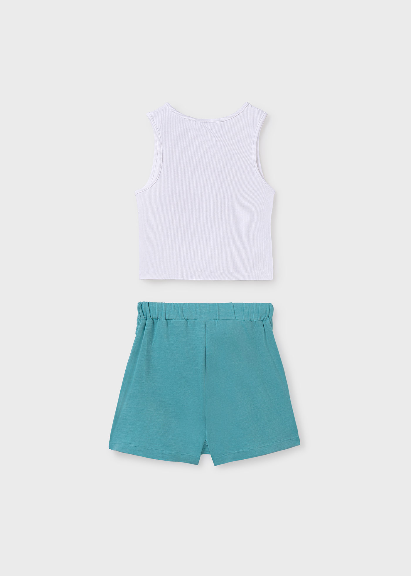 Conjunto falda pantalón y playera canalé chica