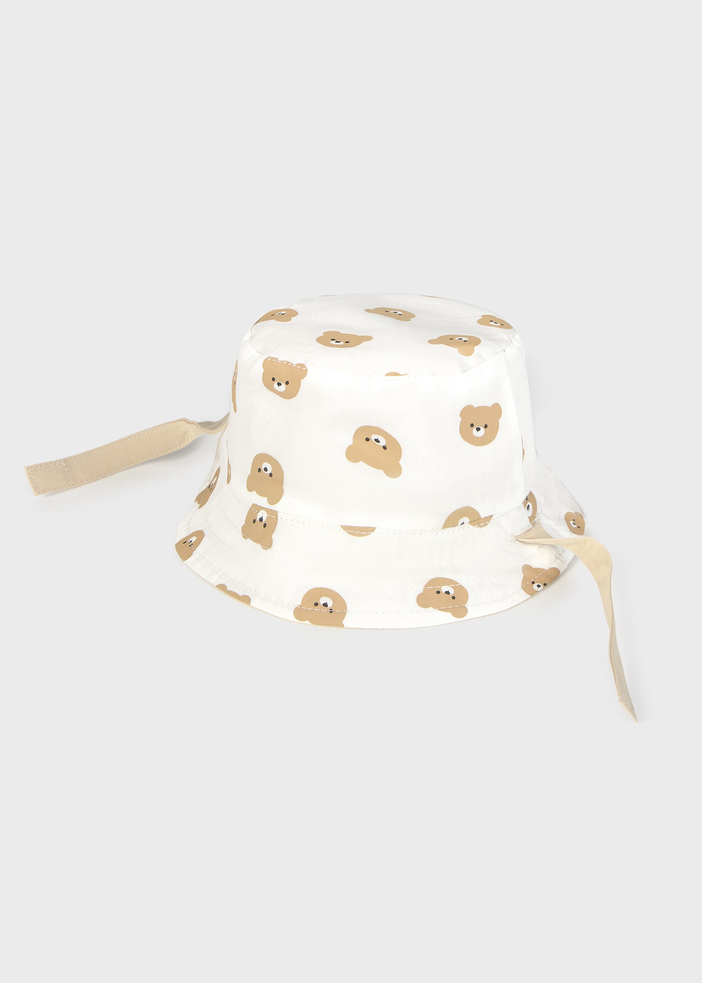 Newborn boy teddy print reversible bonnet