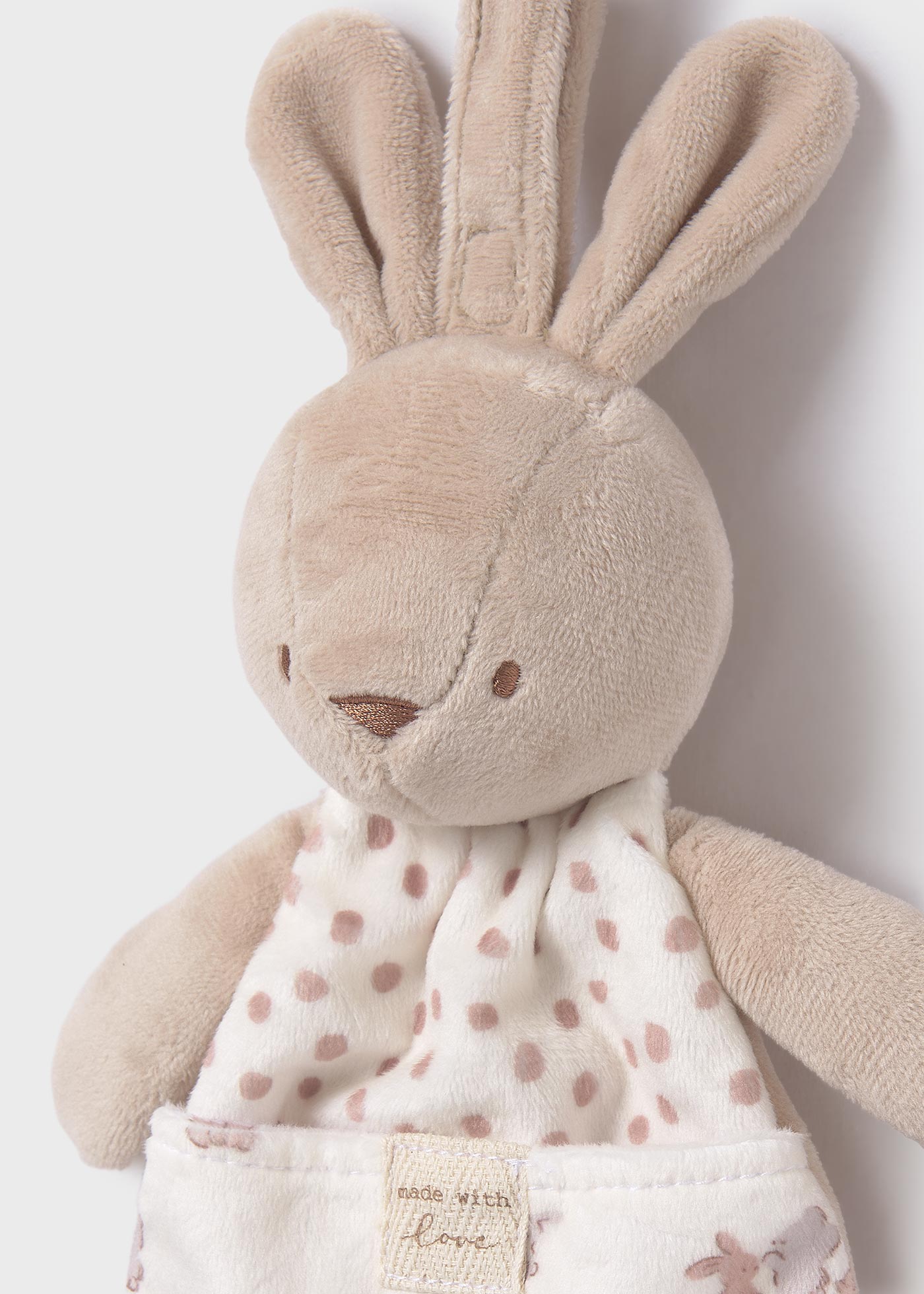 Peluche avec porte tétine bébé