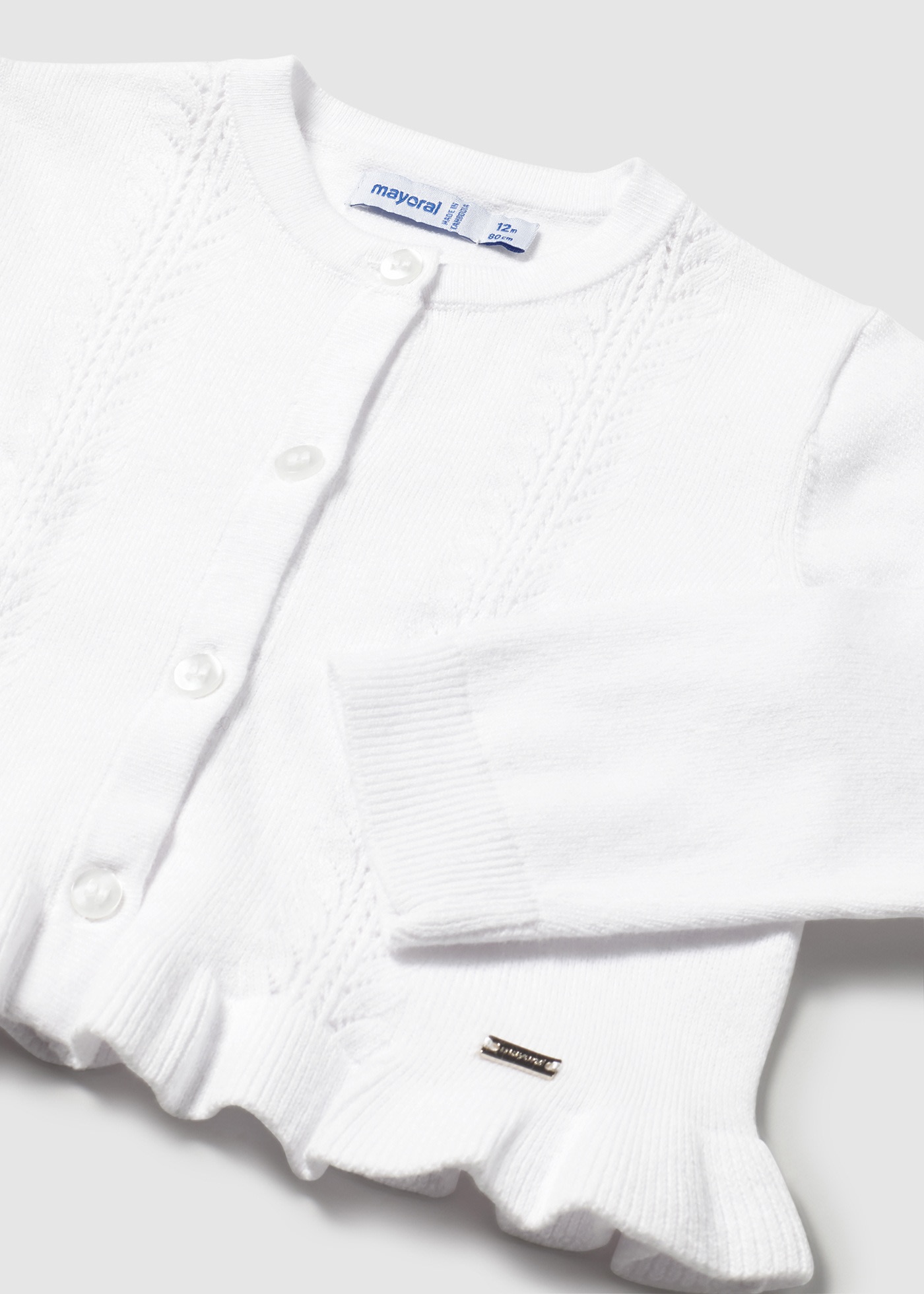Sweter niemowlęcy z falbanką