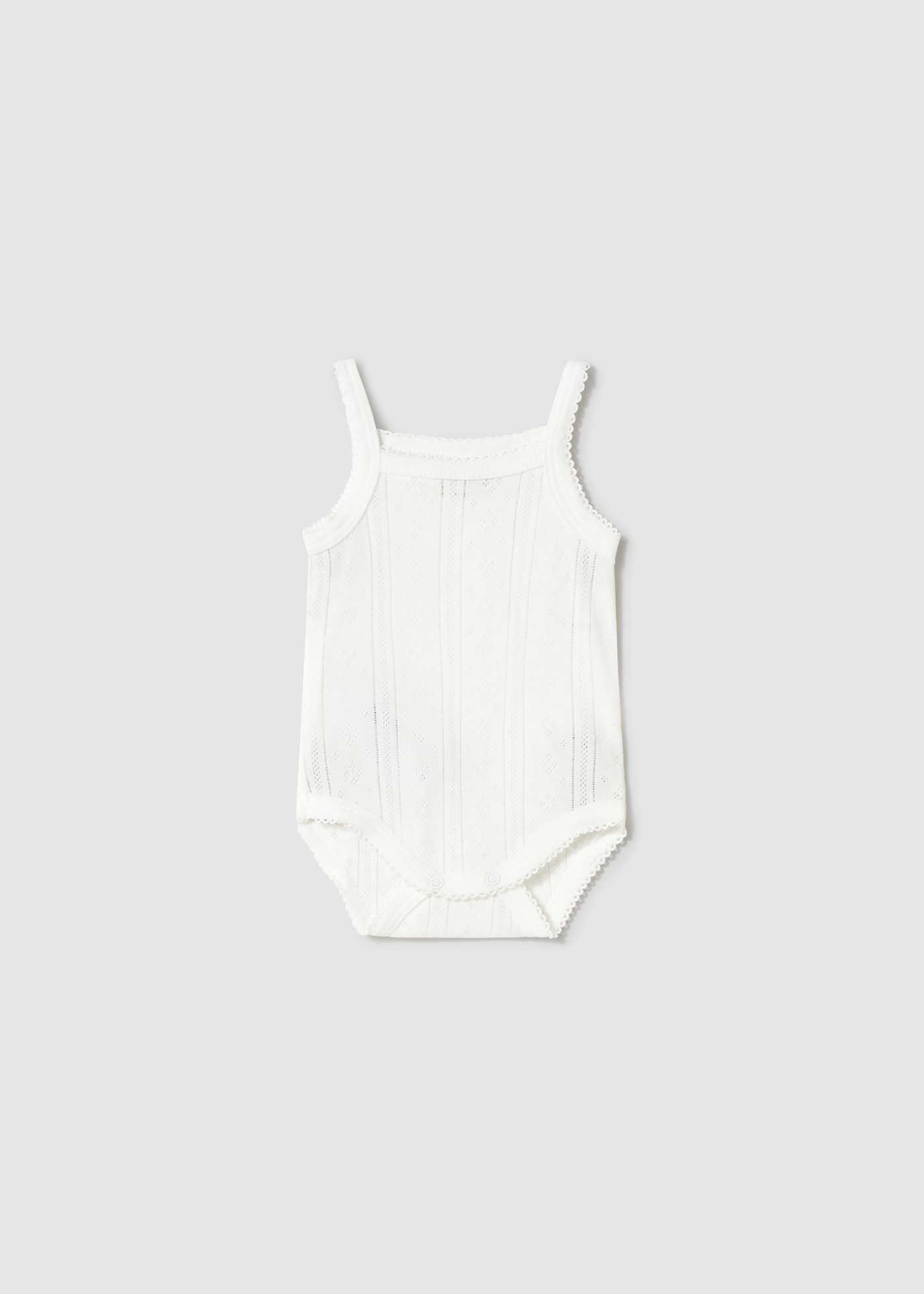 Newborn girl strappy bodysuit