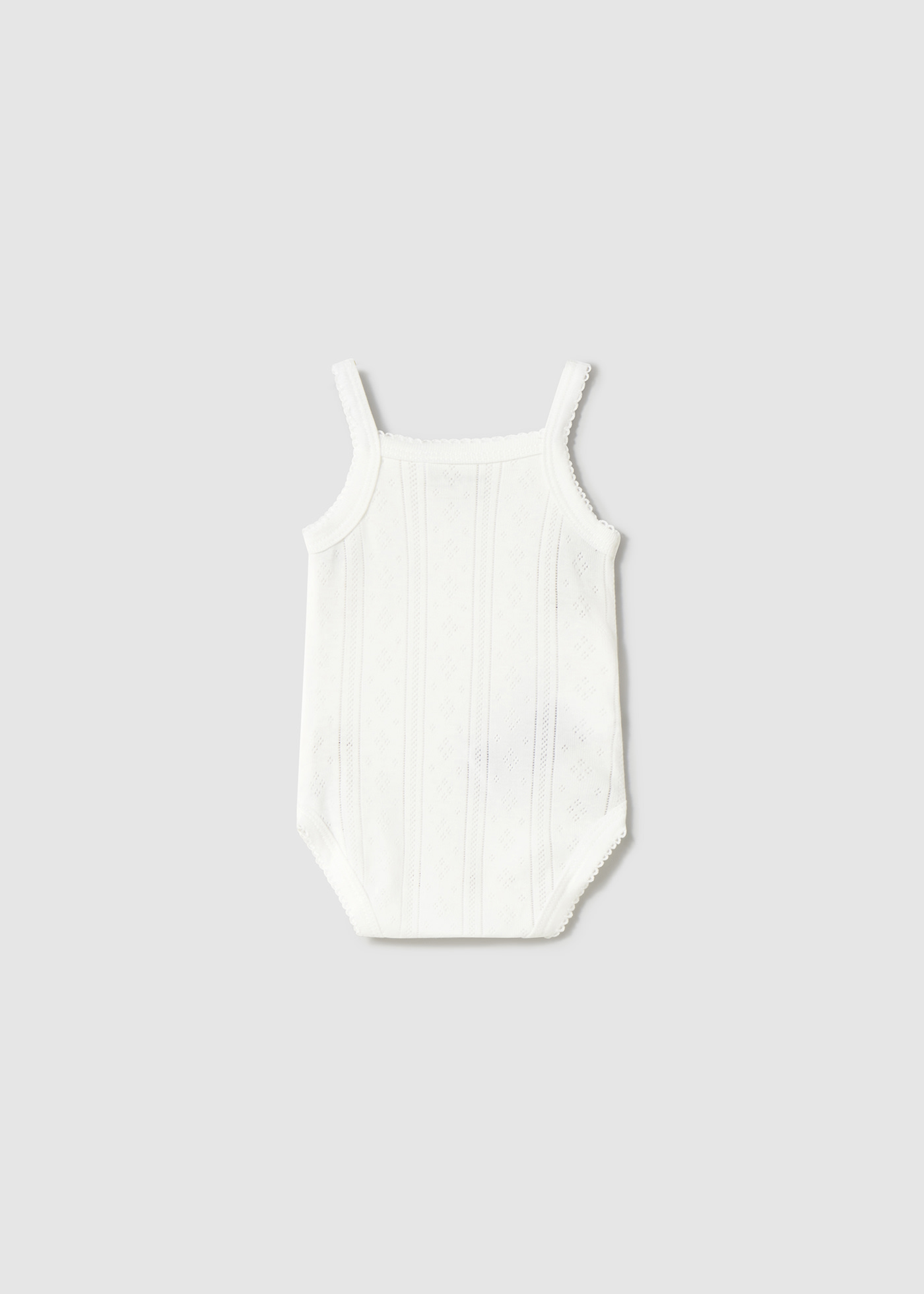 Newborn girl strappy bodysuit