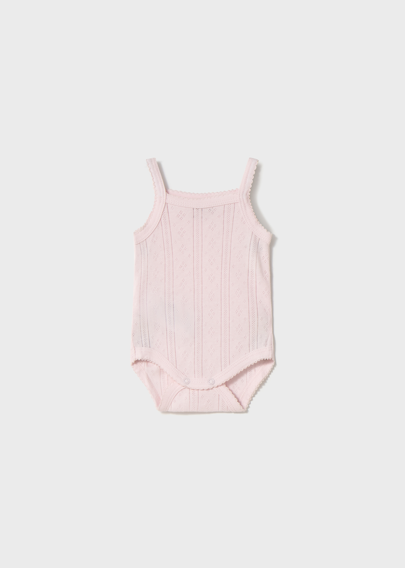 Newborn girl strappy bodysuit