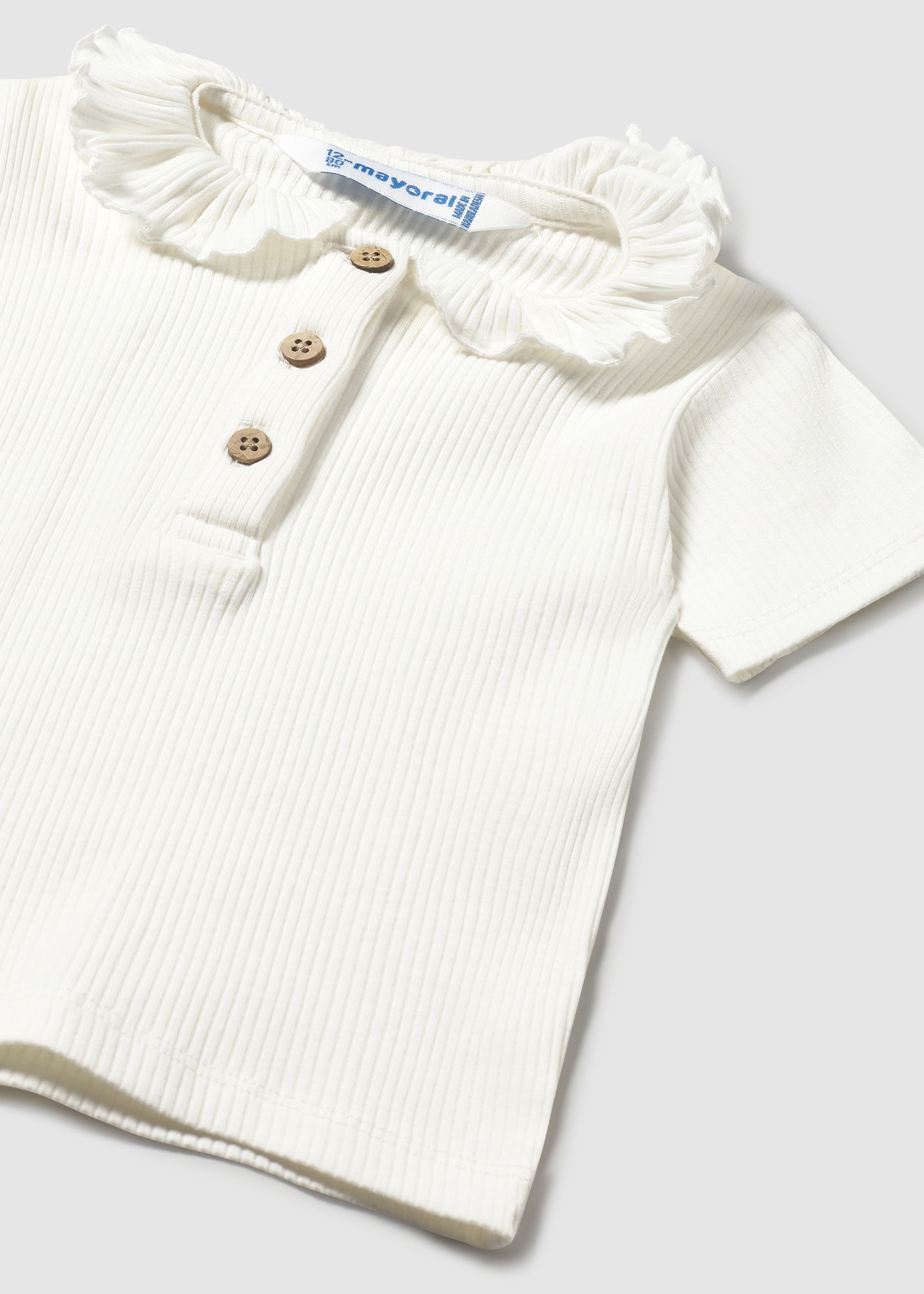 Baby ribbed polo shirt with ruffle collar