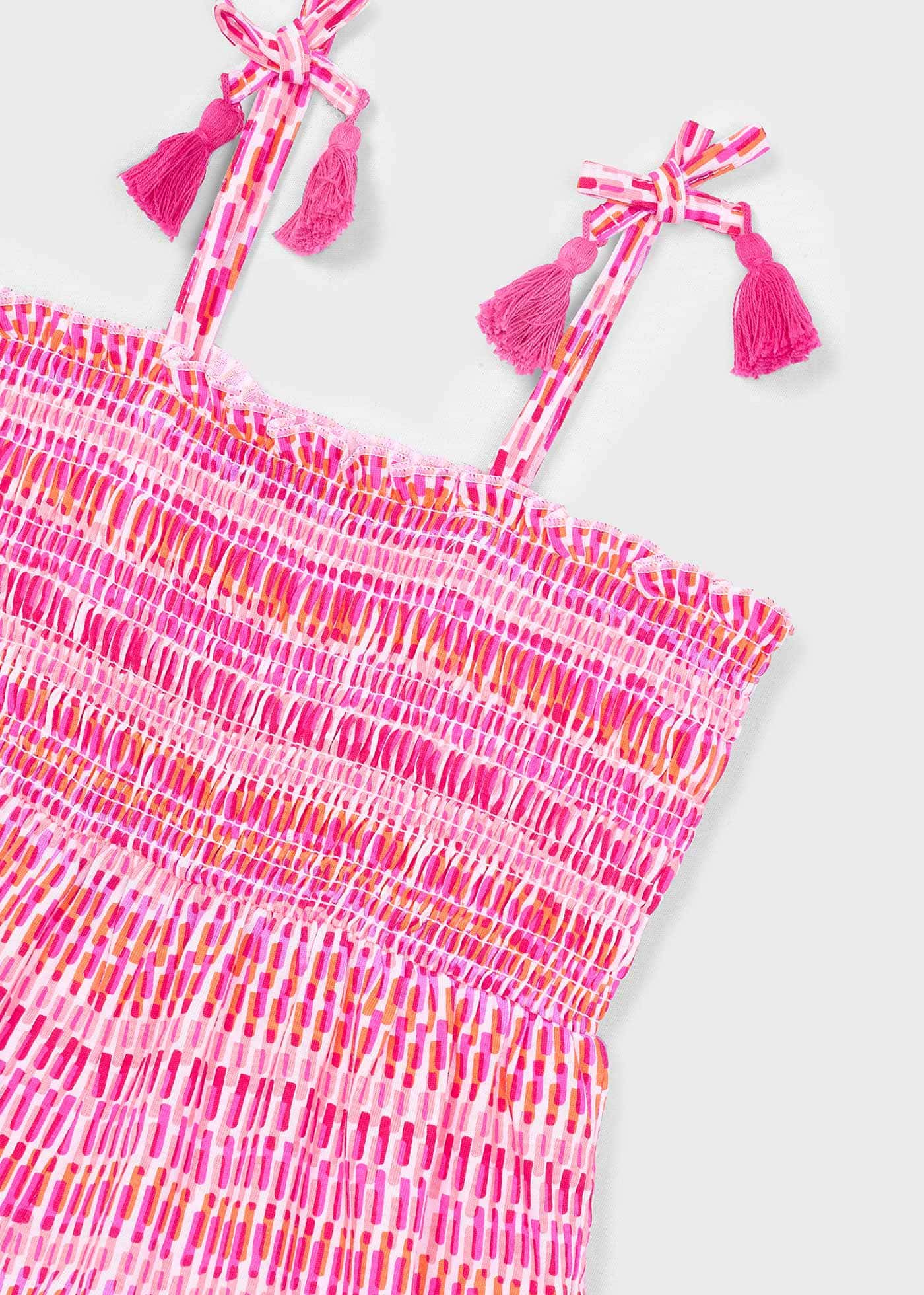 Macacão curto estampado ninho de abelha menina