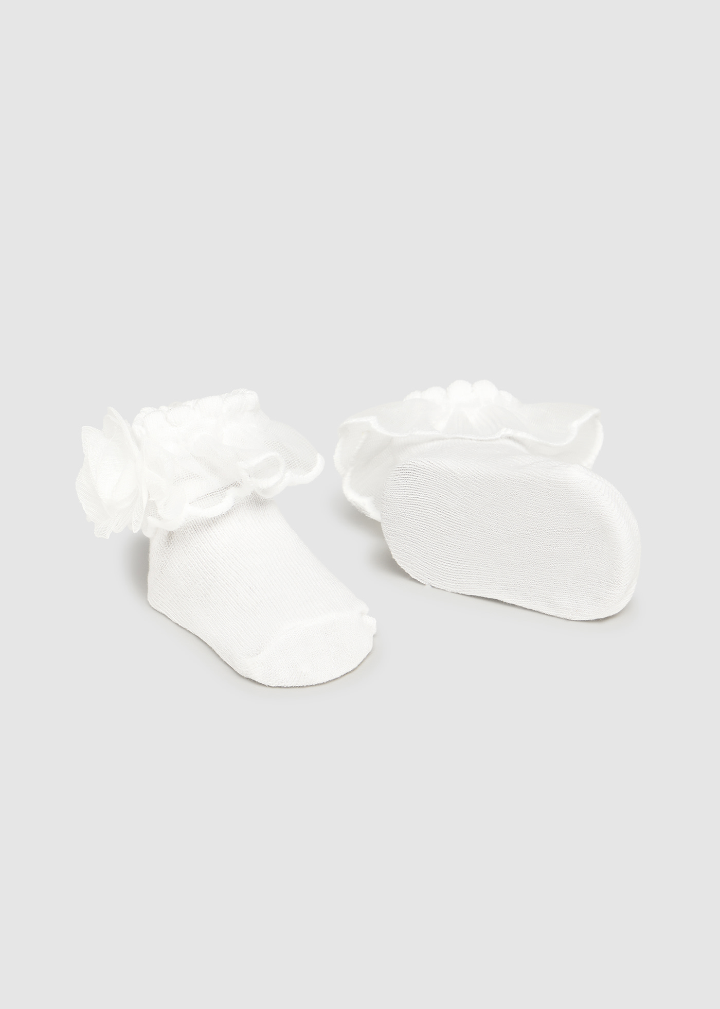 Set Haarband und Socken Neugeborene Mädchen