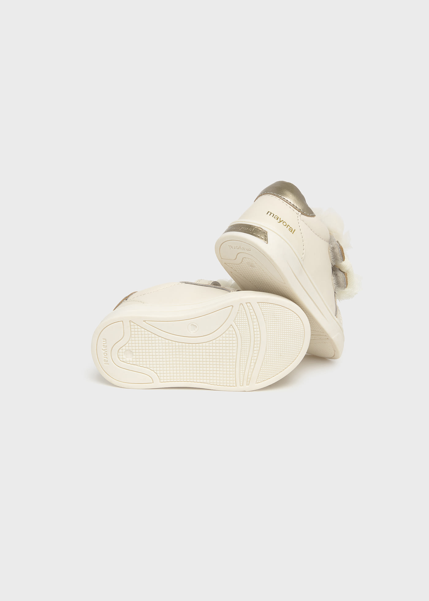 Buty sportowe ze skóry z kokardkami dla niemowlęcia