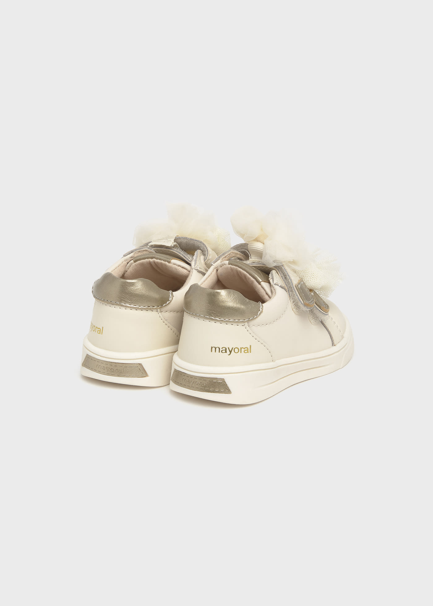 Buty sportowe ze skóry z kokardkami dla niemowlęcia