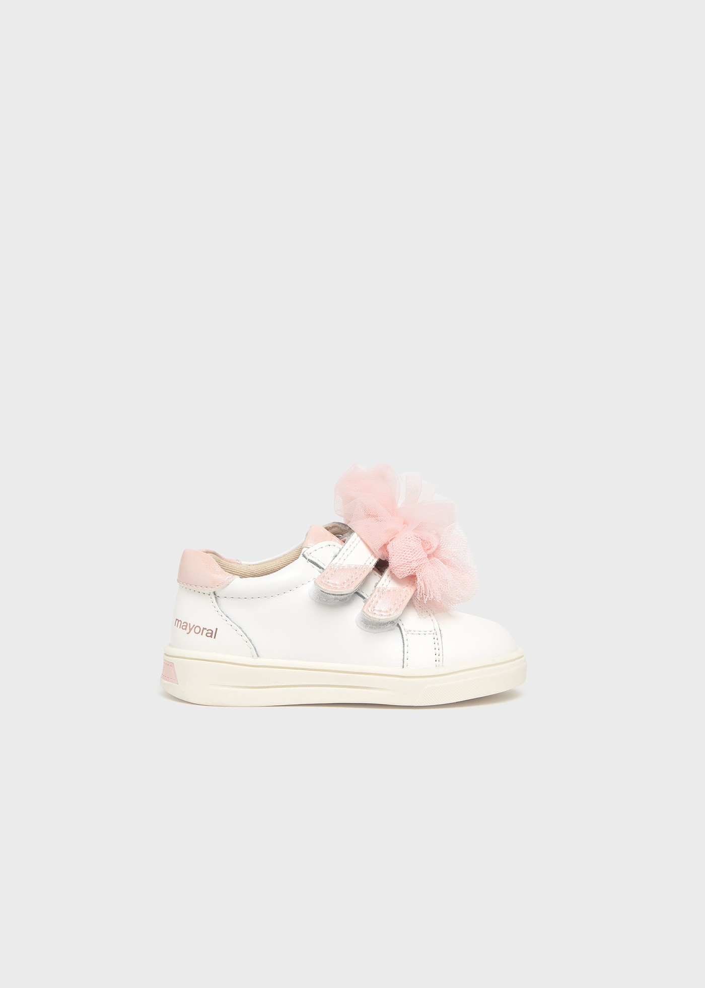 Buty sportowe ze skóry z kokardkami dla niemowlęcia