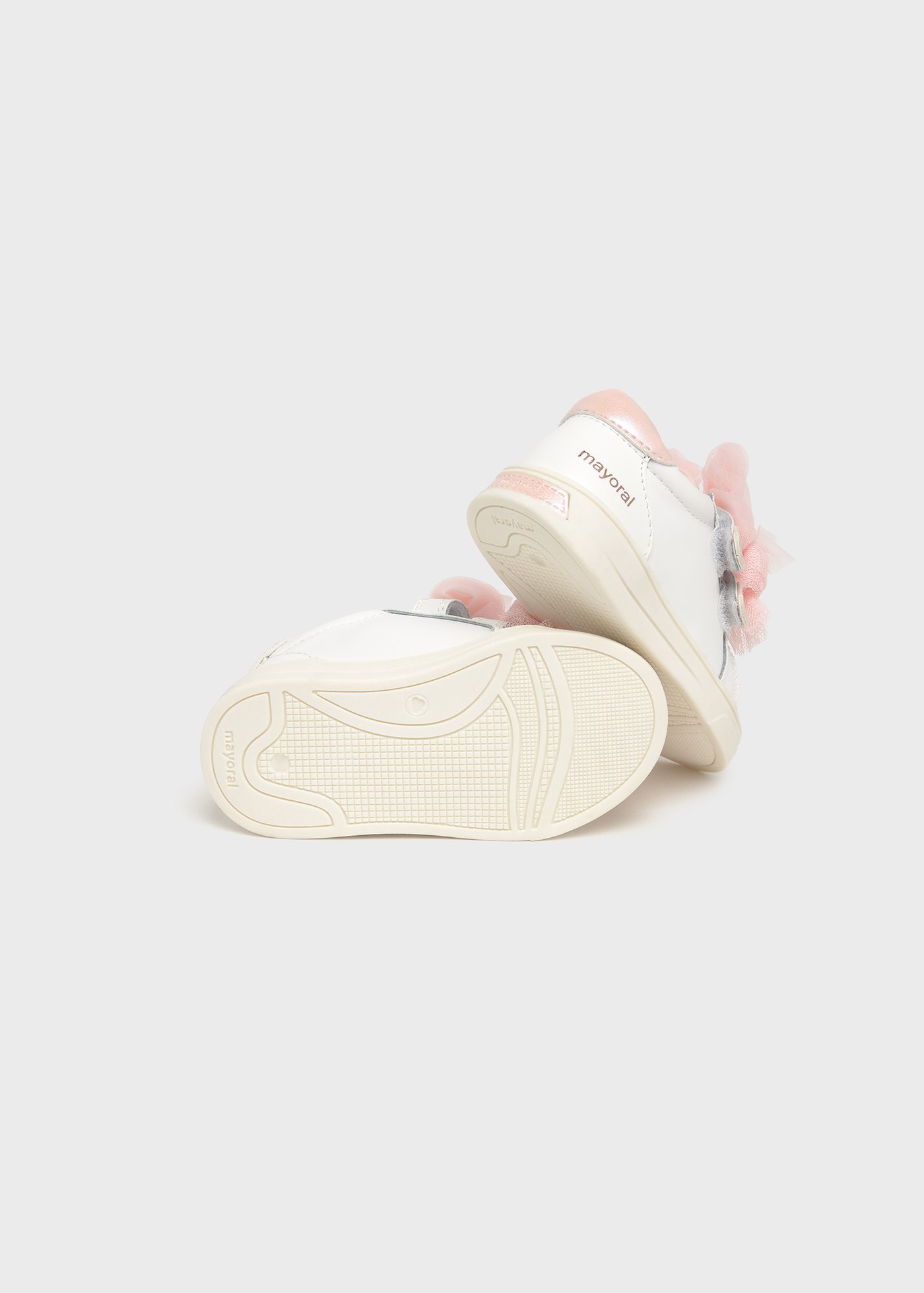 Buty sportowe ze skóry z kokardkami dla niemowlęcia