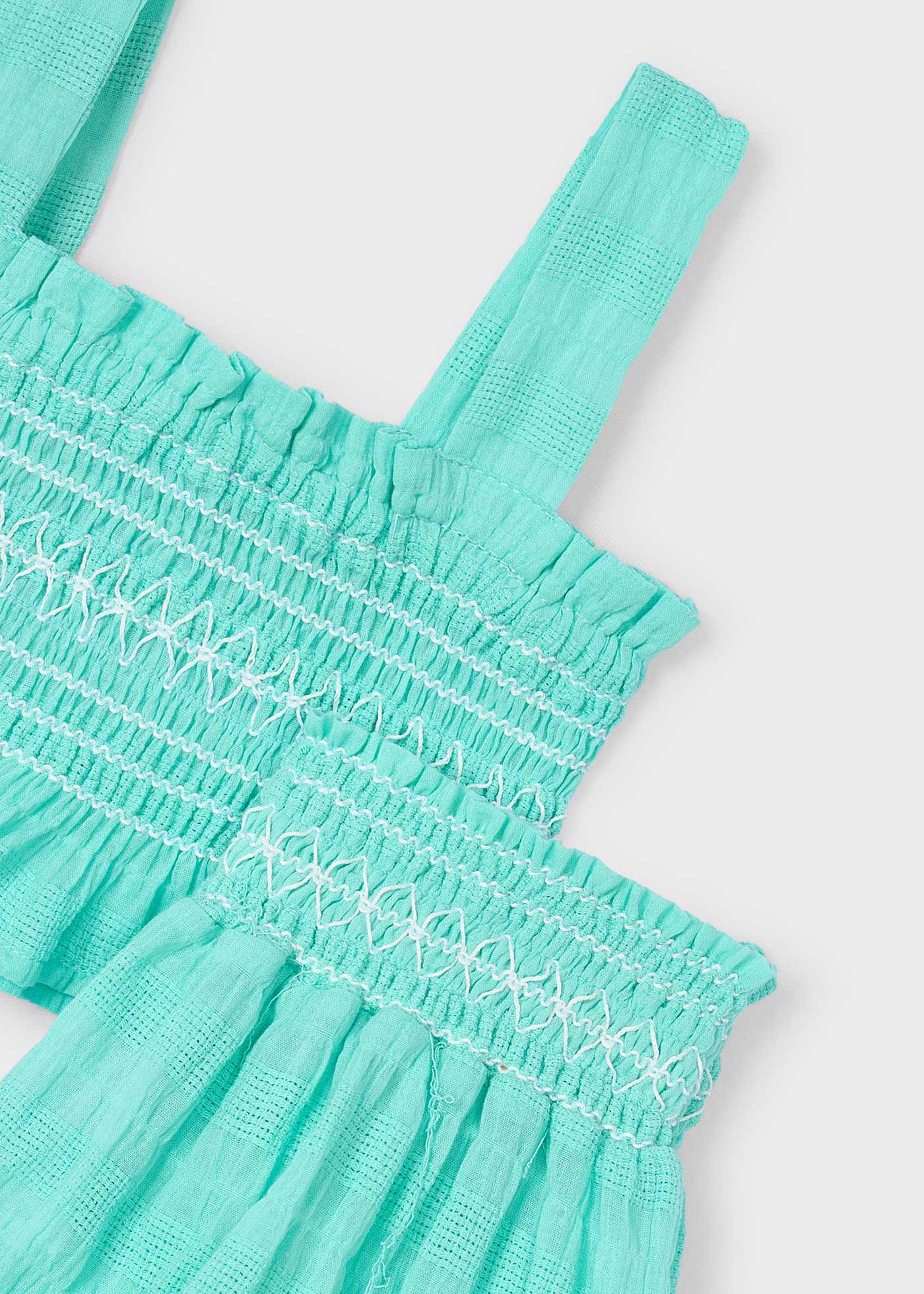 Conjunto pantalón corto y top nido de abeja niña