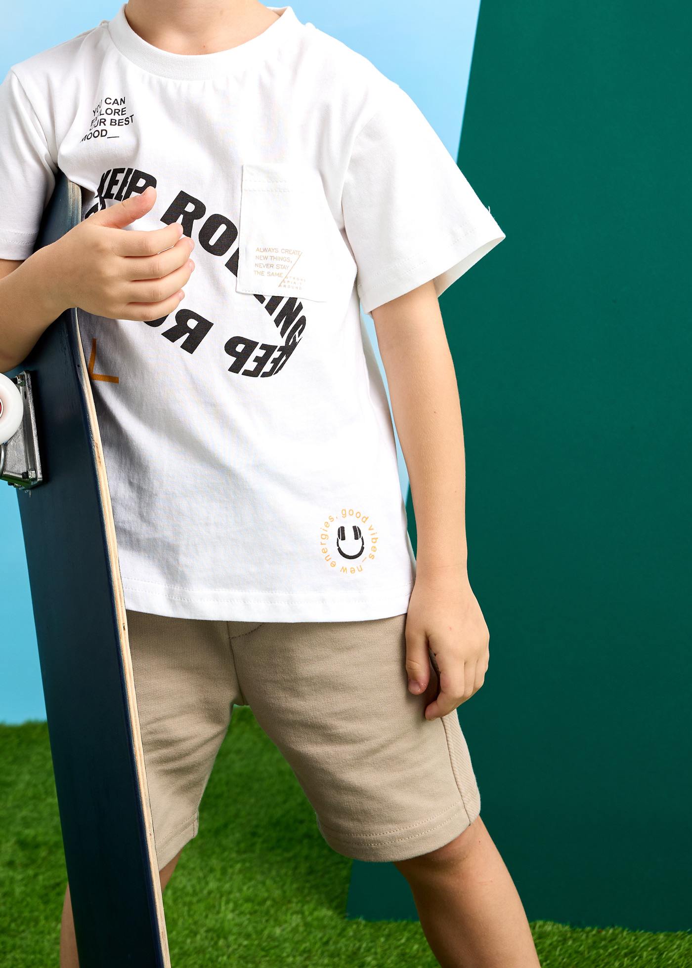 Conjunto bermuda e t-shirt texto menino