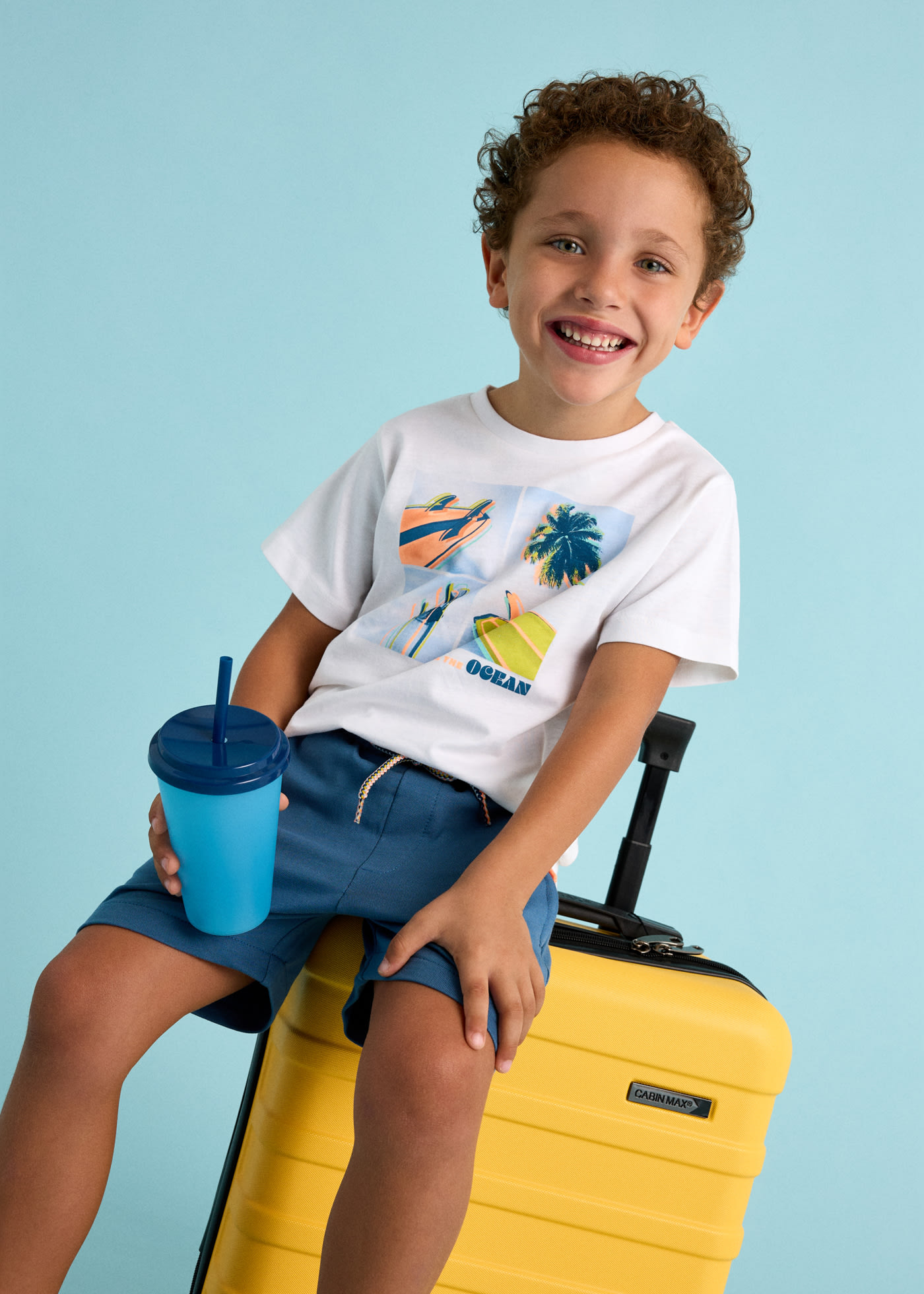 Conjunto bermuda y playera surf niño