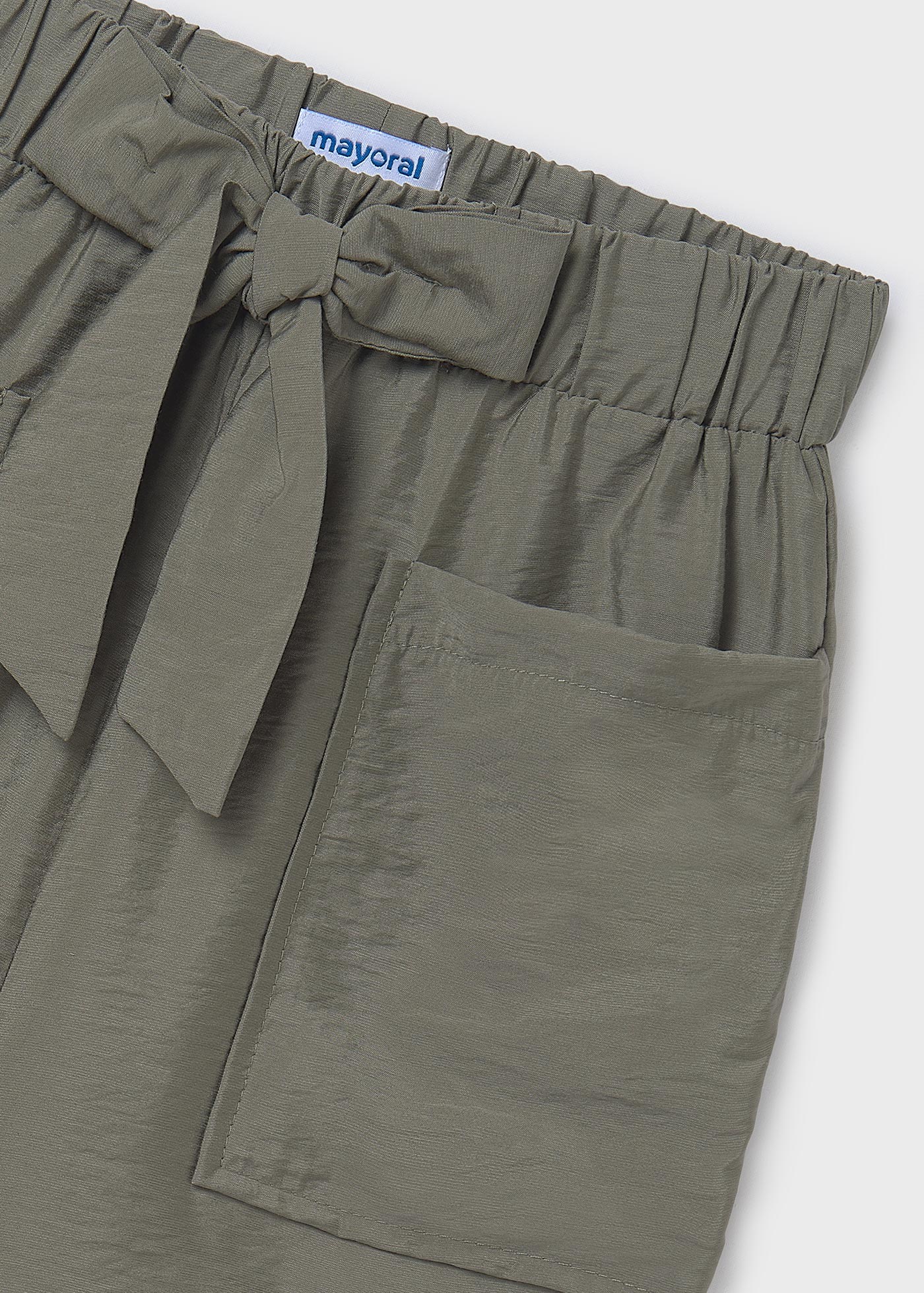 Pantalón corto bolsillos chica