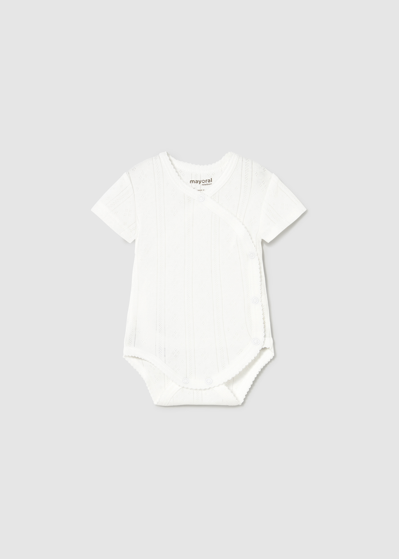 Newborn girl openwork bodysuit