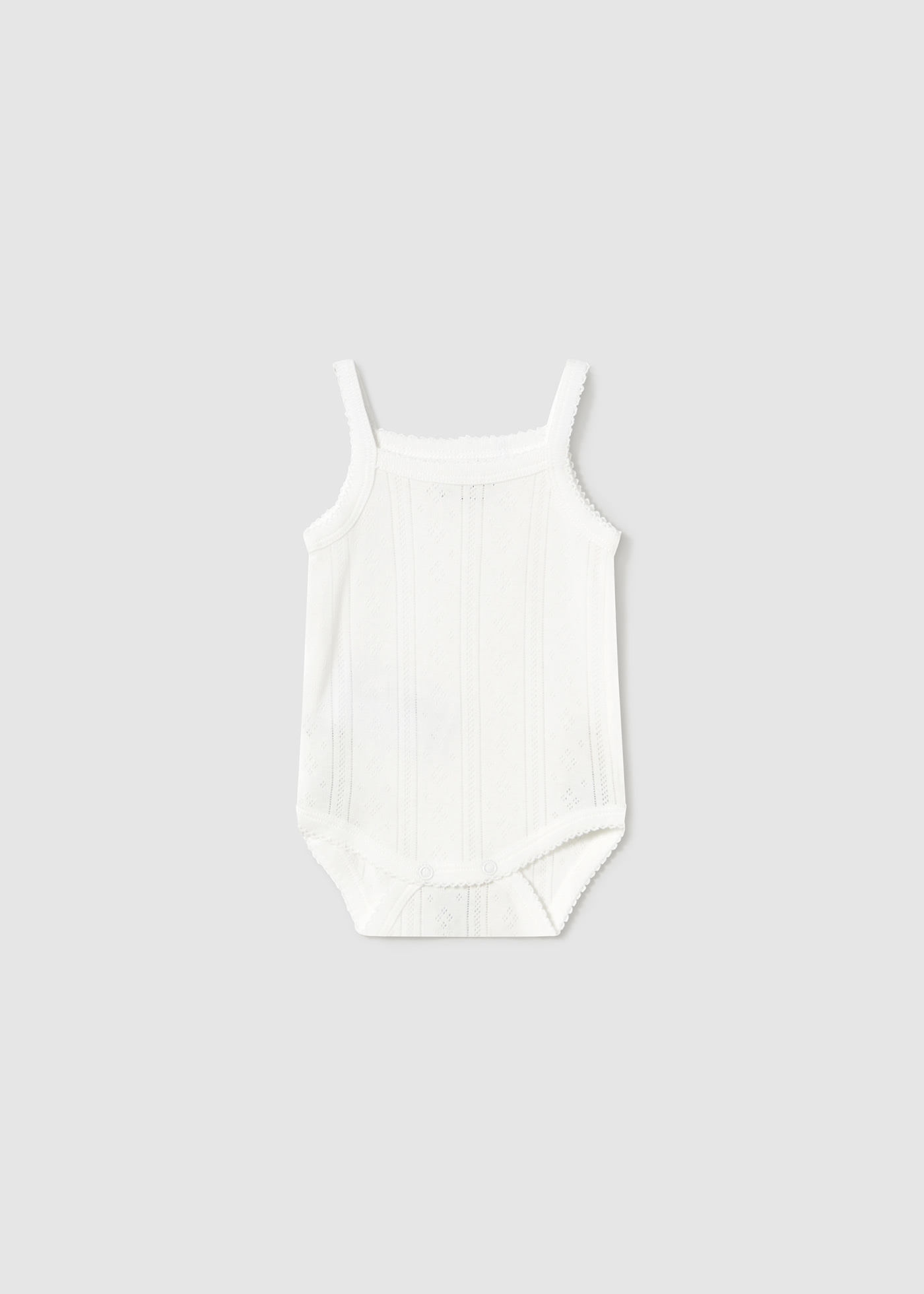 Newborn girl strappy bodysuit