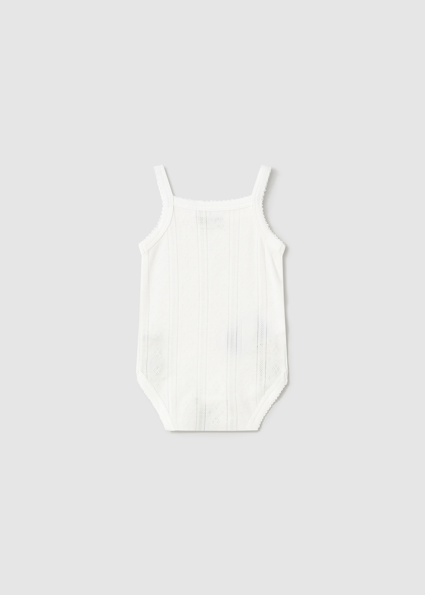 Newborn girl strappy bodysuit