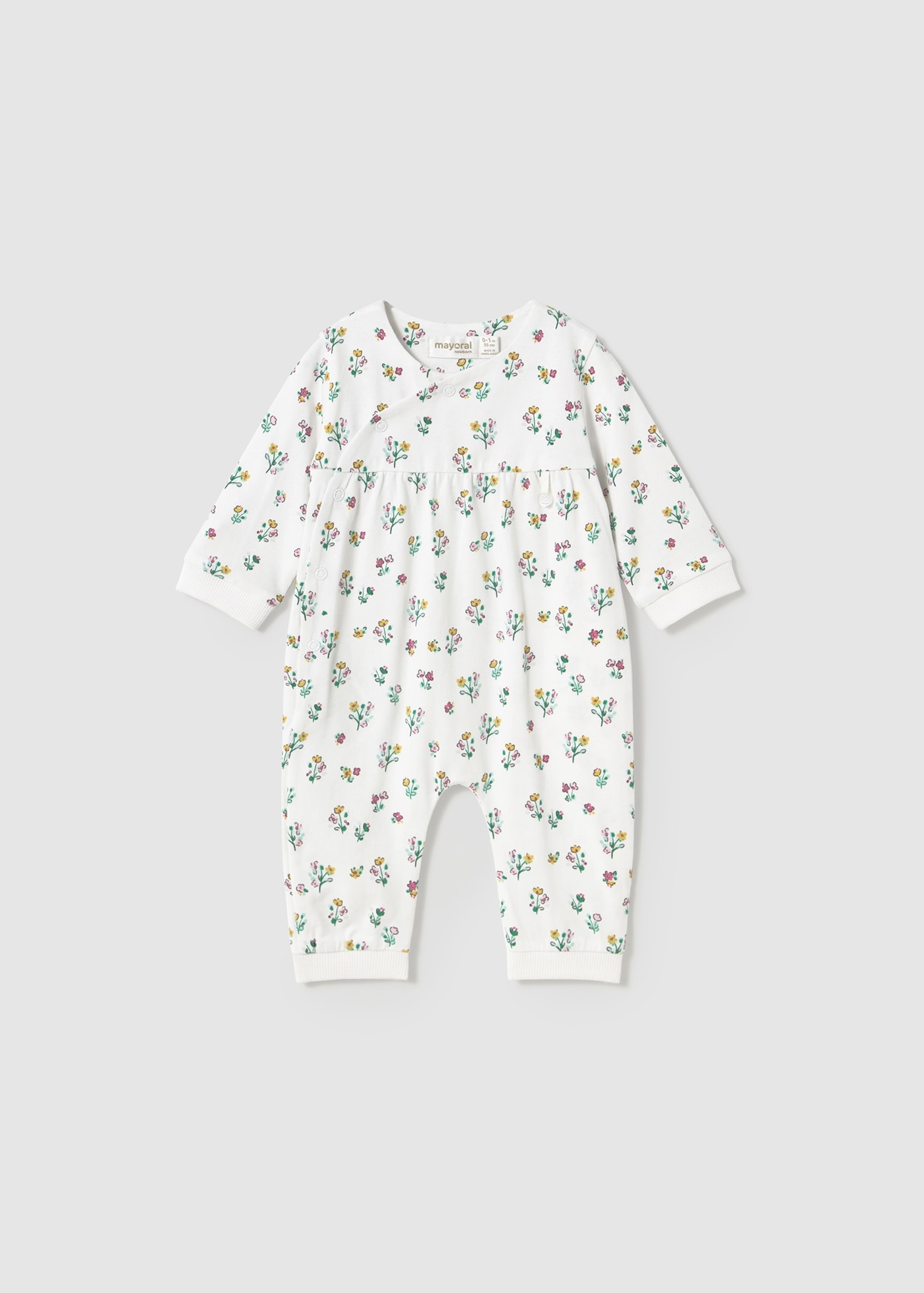 Newborn girl romper with foot covers