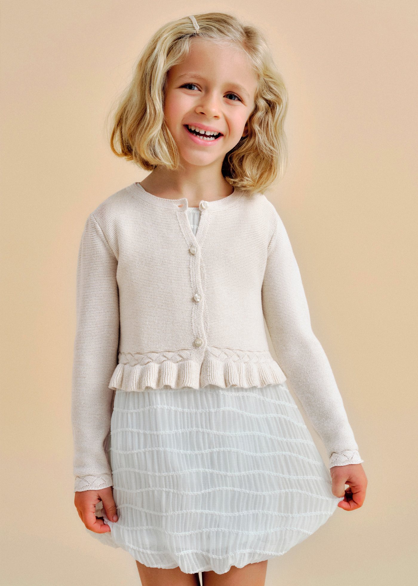 Girl knitted cardigan with braided details