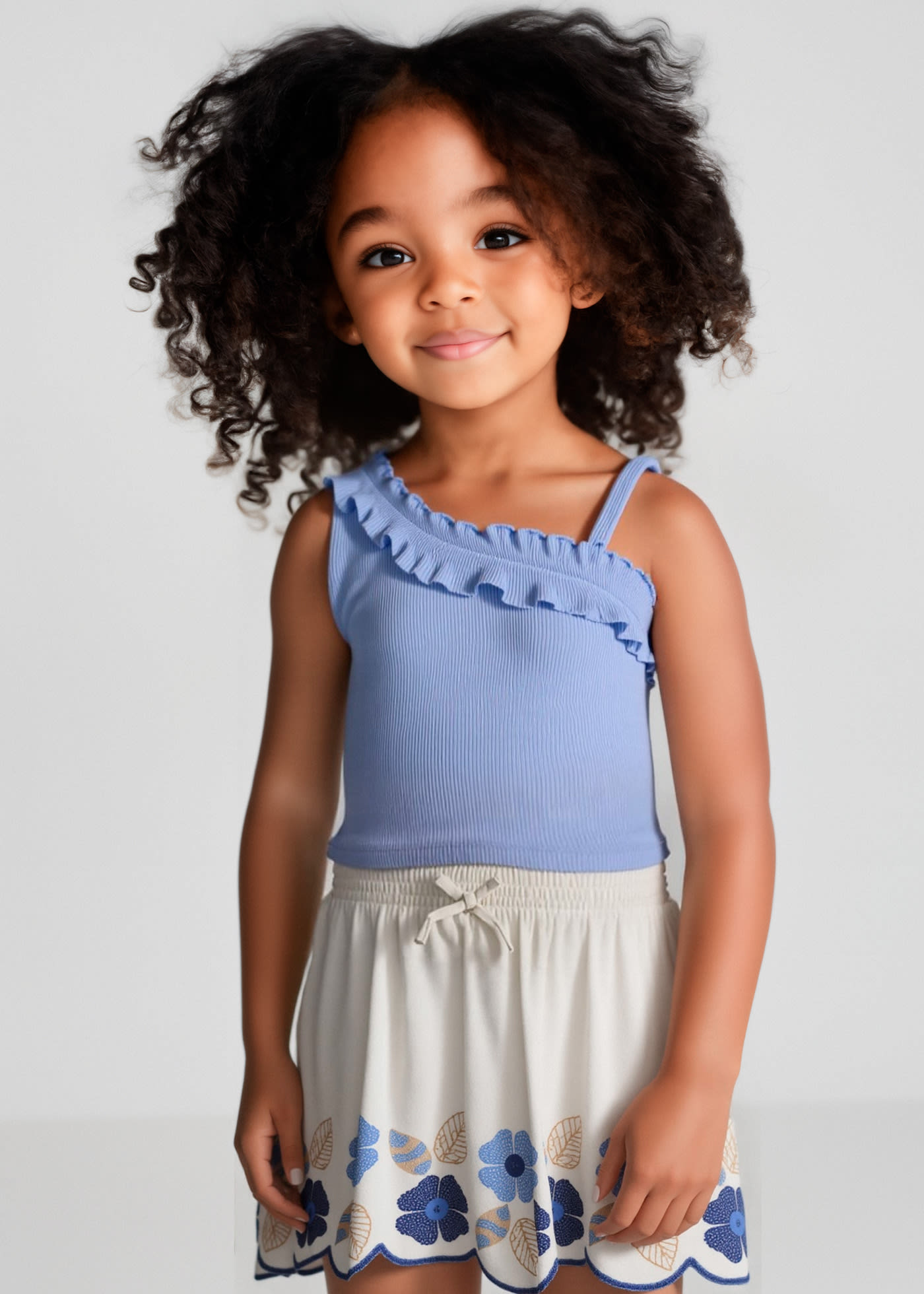 Top asimmetrico volant bambina