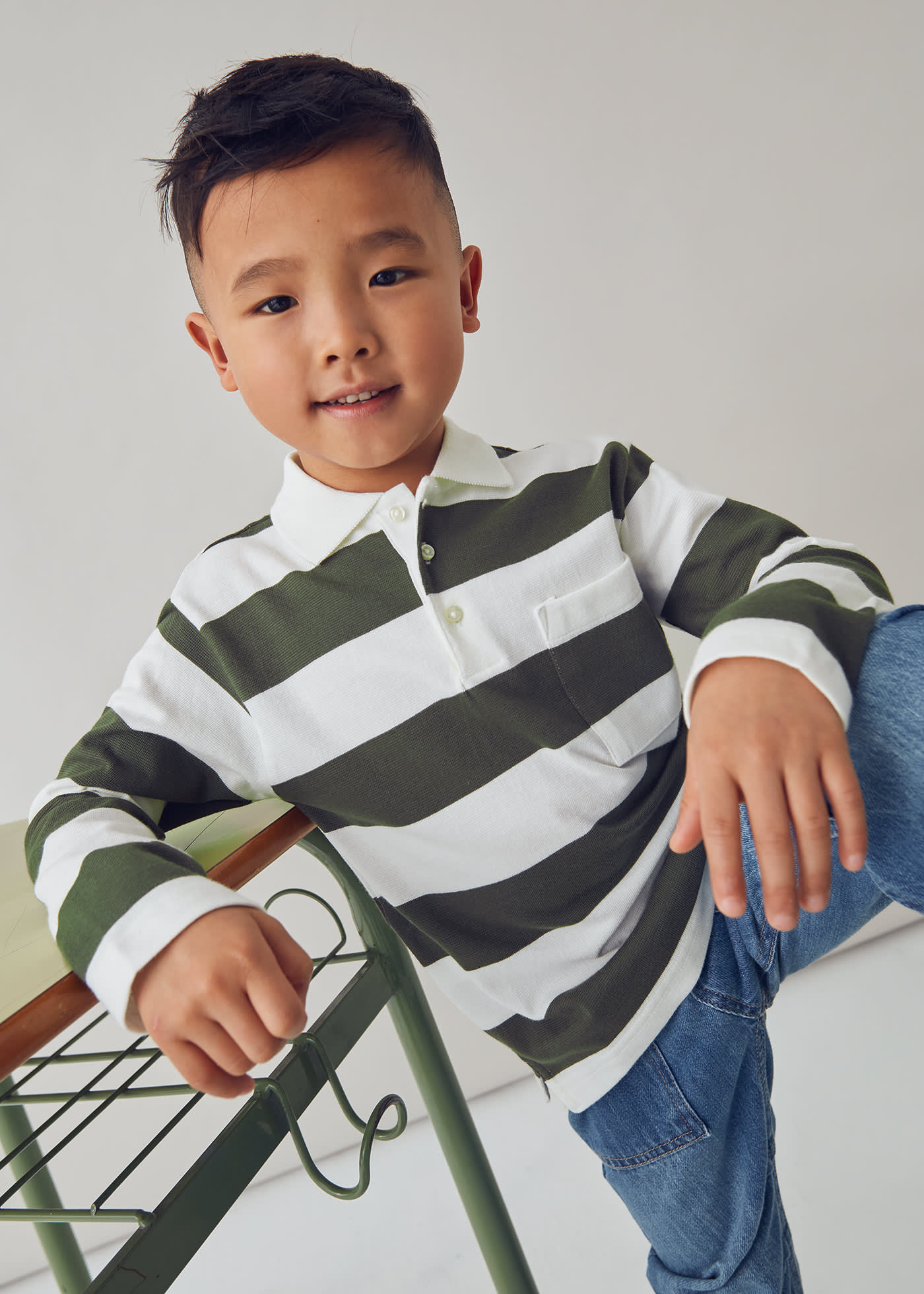 Boys long sleeved striped polo shirt
