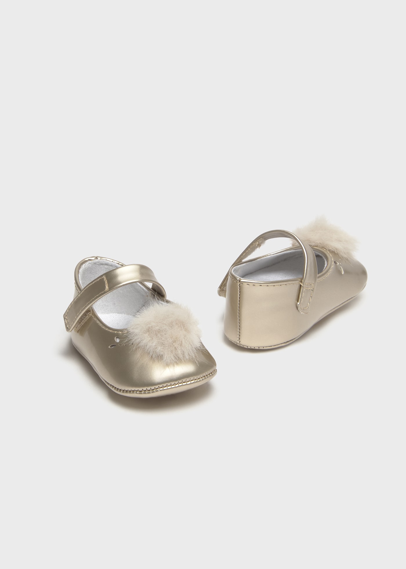 Ballerines à pompon nouveau-né