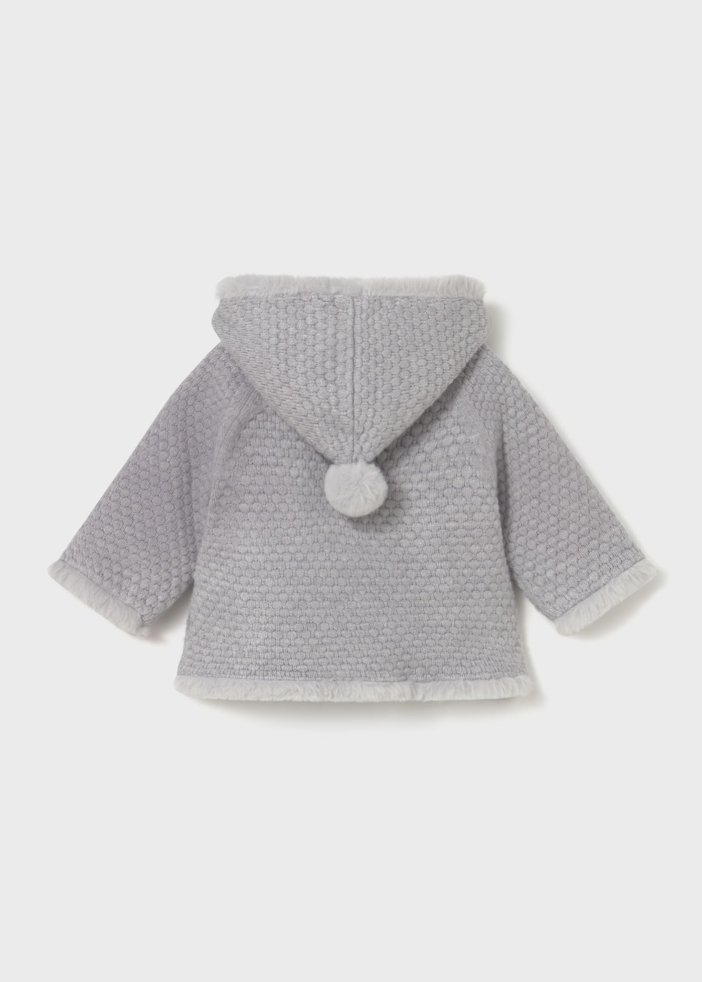 Chaqueta tricot con pelo recién nacida