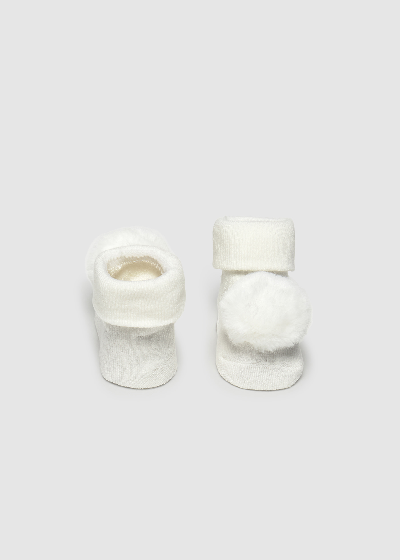 Set diadema y calcetines recién nacida
