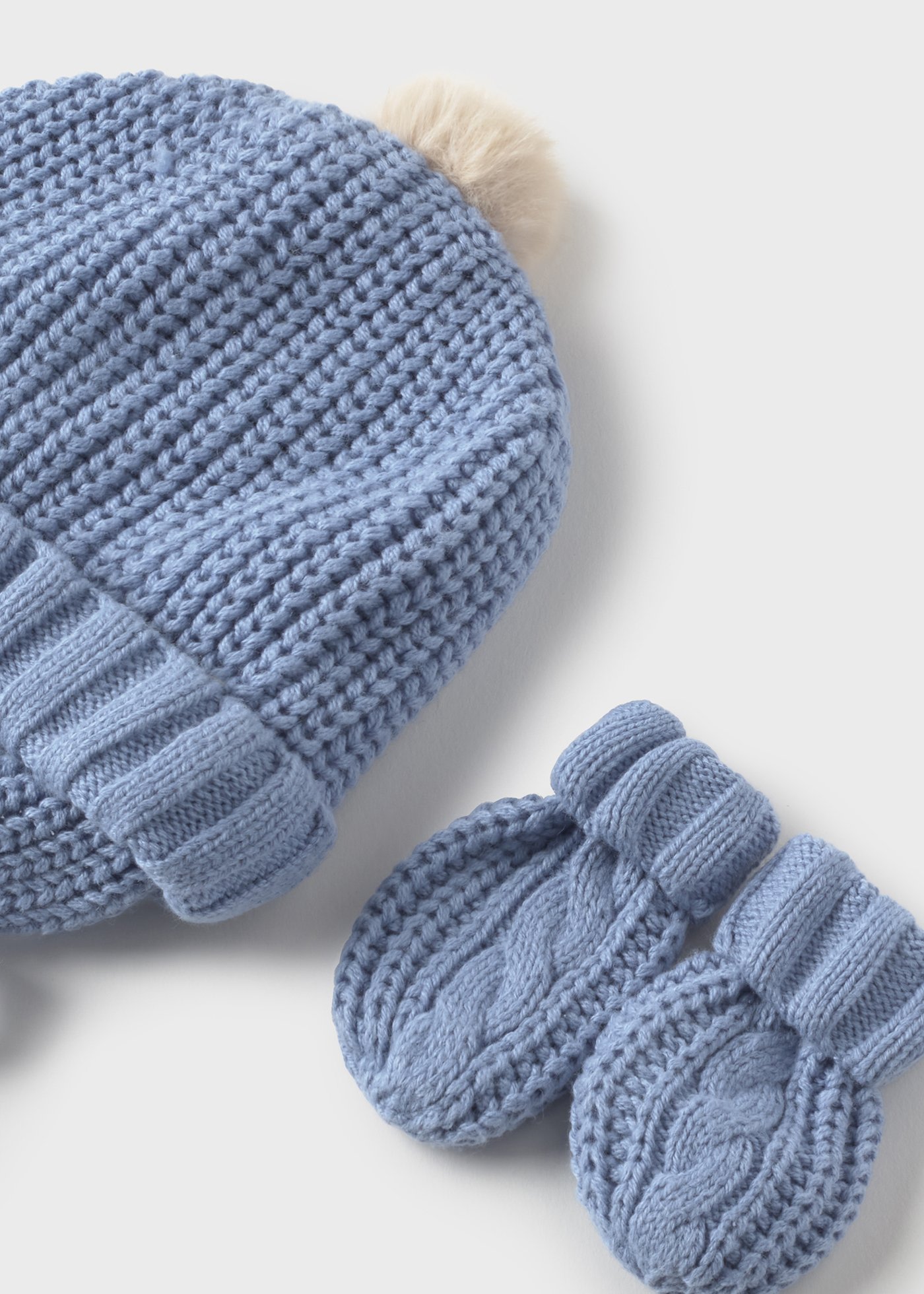 Newborn knitted hat and mittens set
