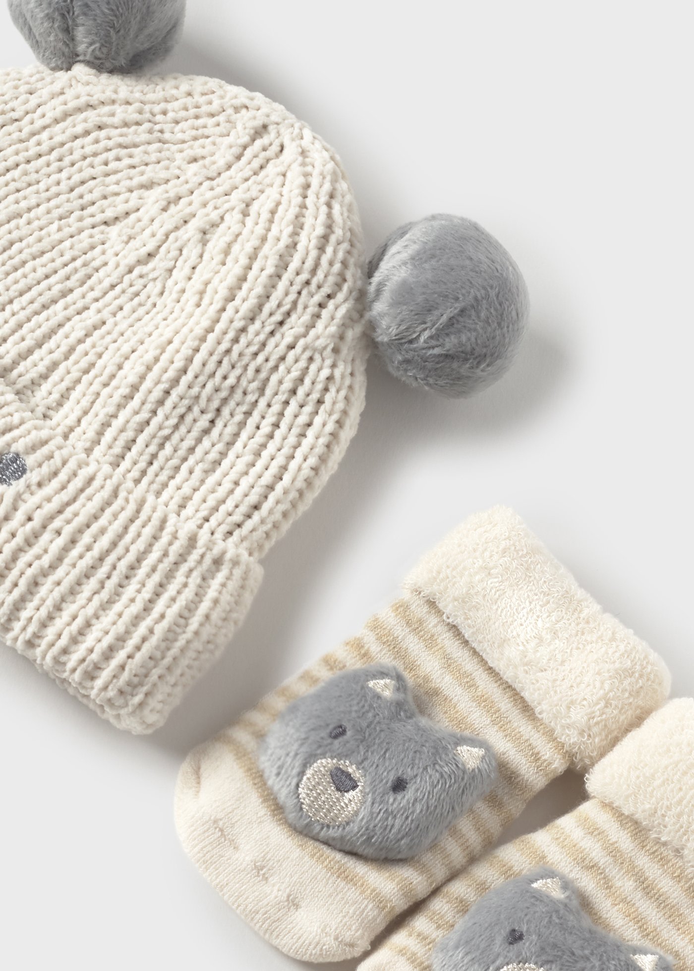 Set de gorro y calcetines unisex bebé recién nacido
