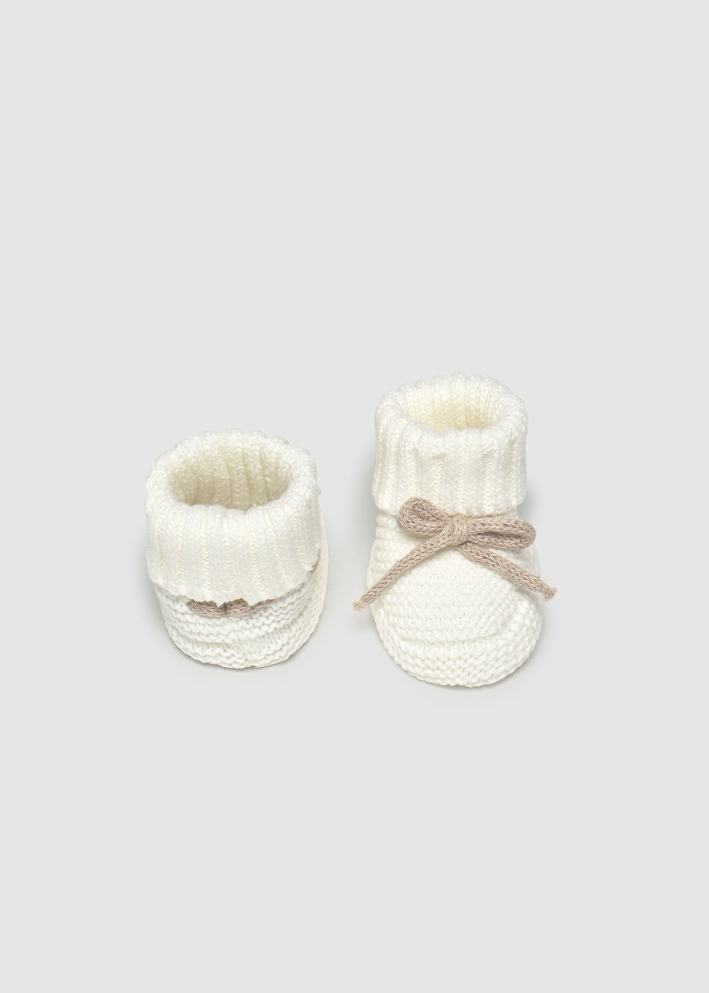 Newborn knitted booties