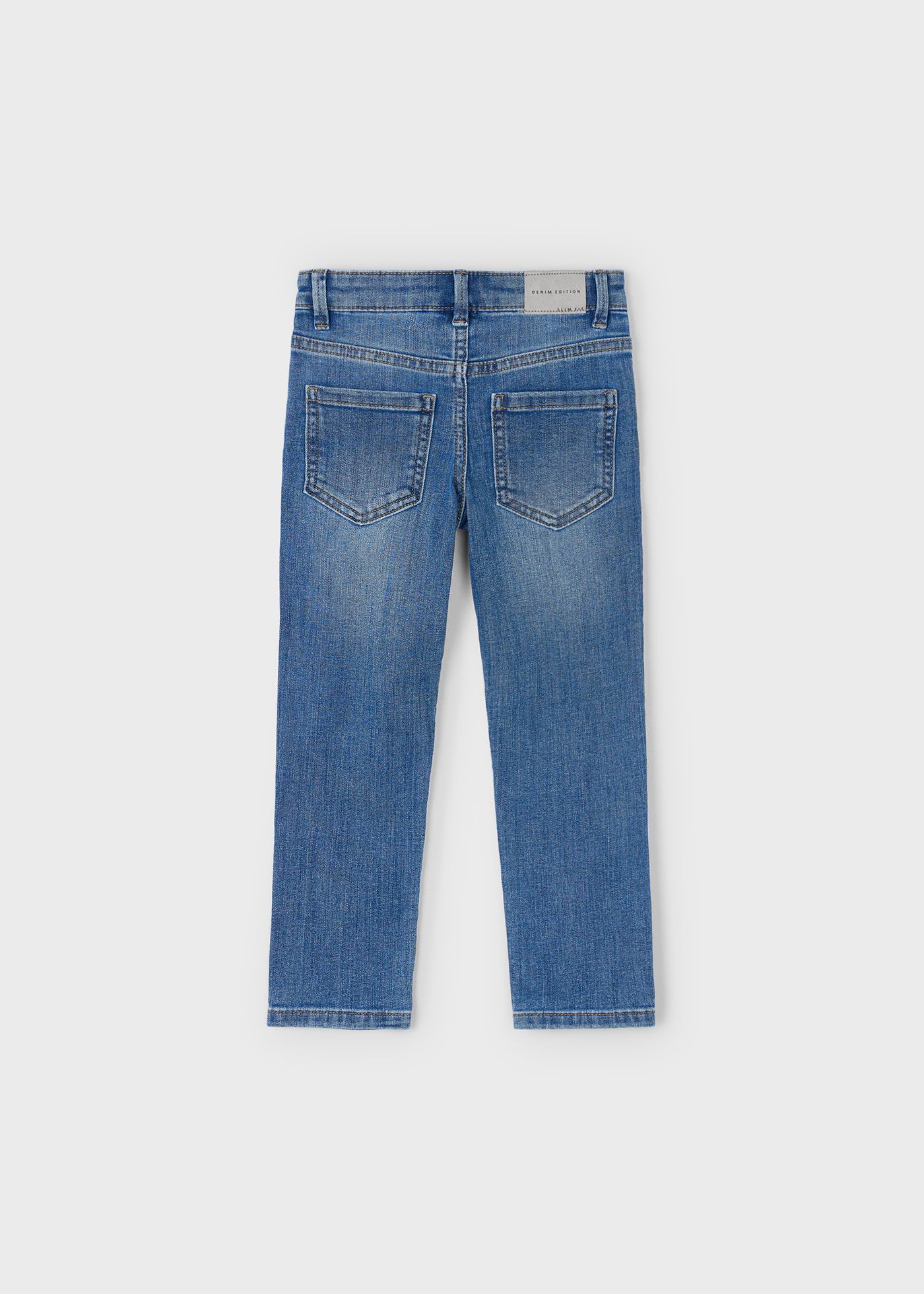 Pantalón vaquero entallado básico niño