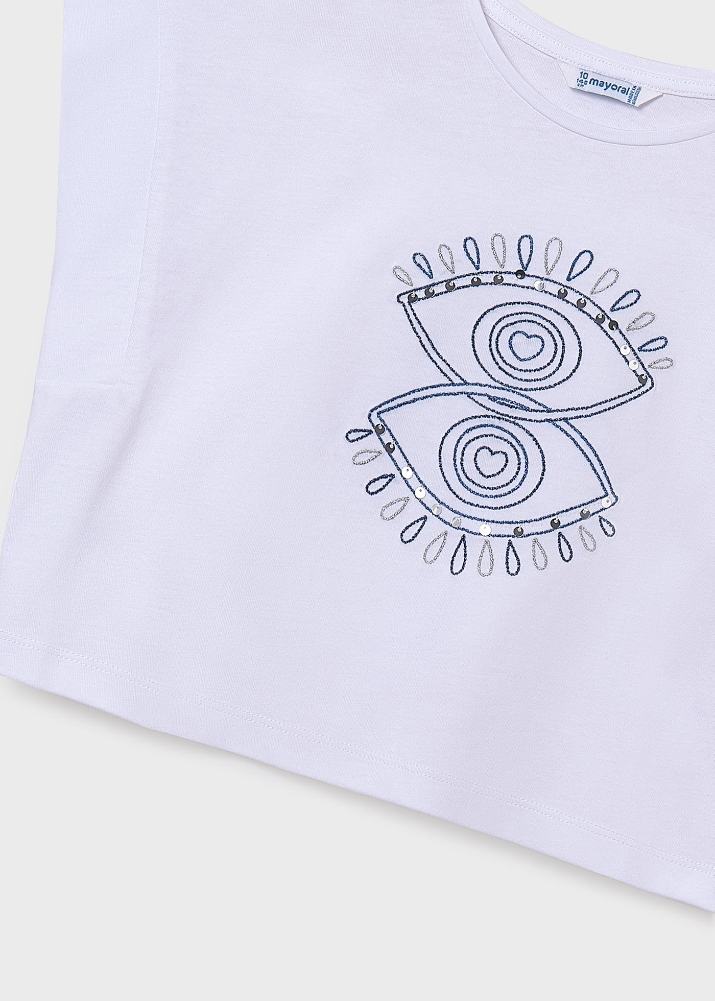 Camiseta hombro caído ojo chica