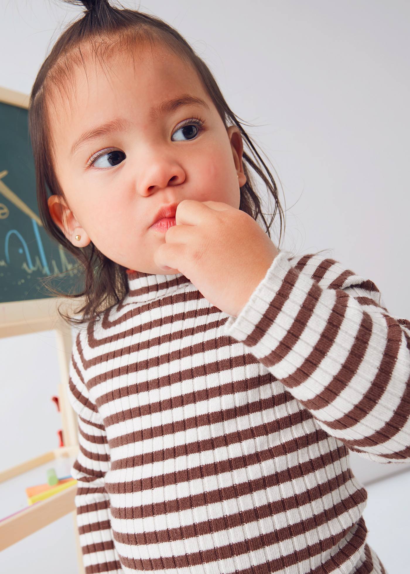 Babys knitted jumper with mid high neck