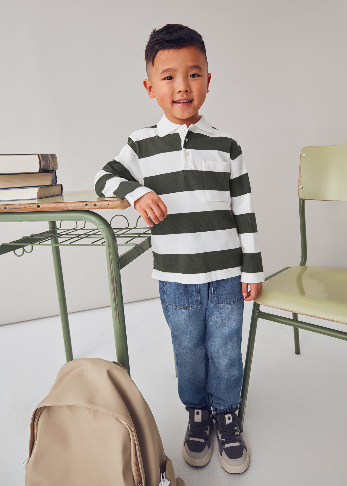 Boys long sleeved striped polo shirt