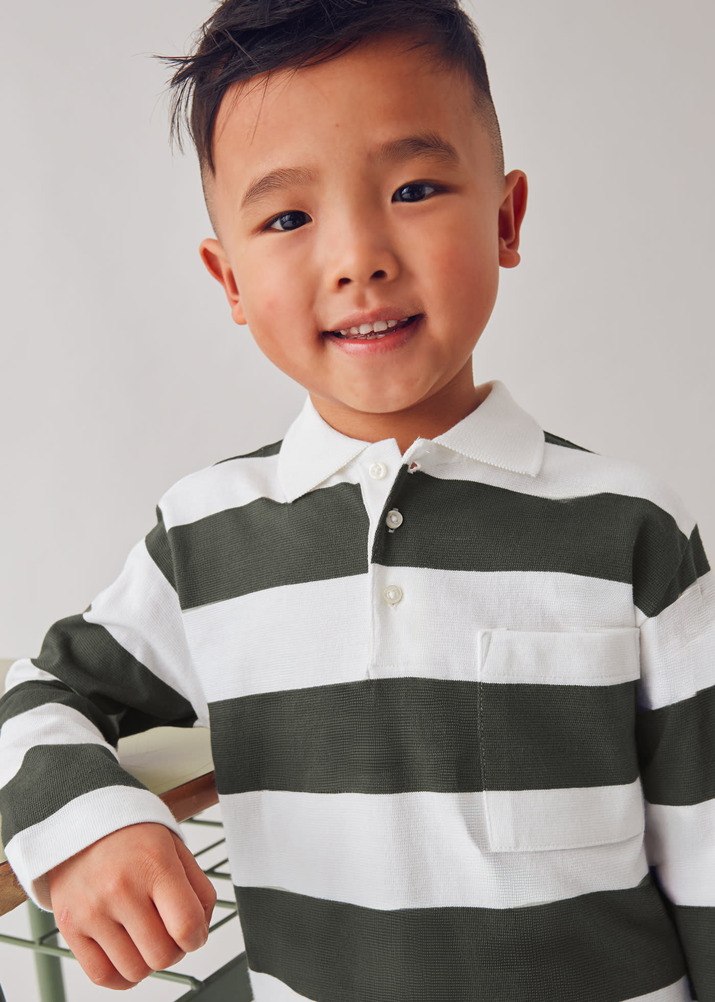 Boys long sleeved striped polo shirt